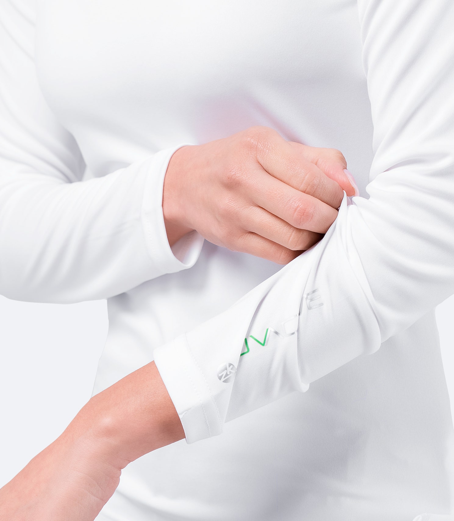White Zhik Women's UVActive Long Sleeve Top sleeve detail, highlighting lightweight, breathable knit and anti-snag performance.