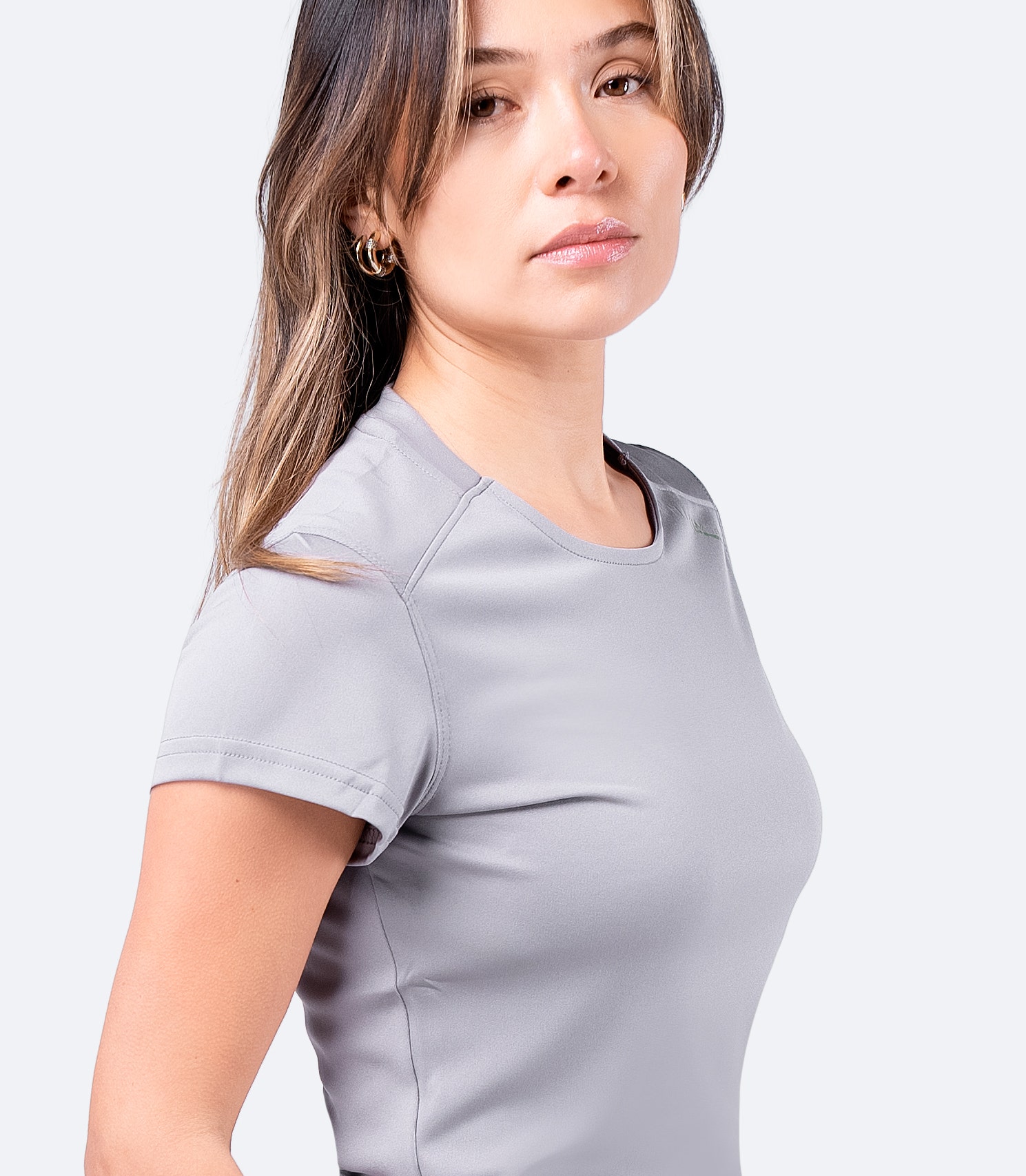 Close-up of grey Zhik Women's UVActive Top sleeves, designed for comfort and durability against Velcro® snags
