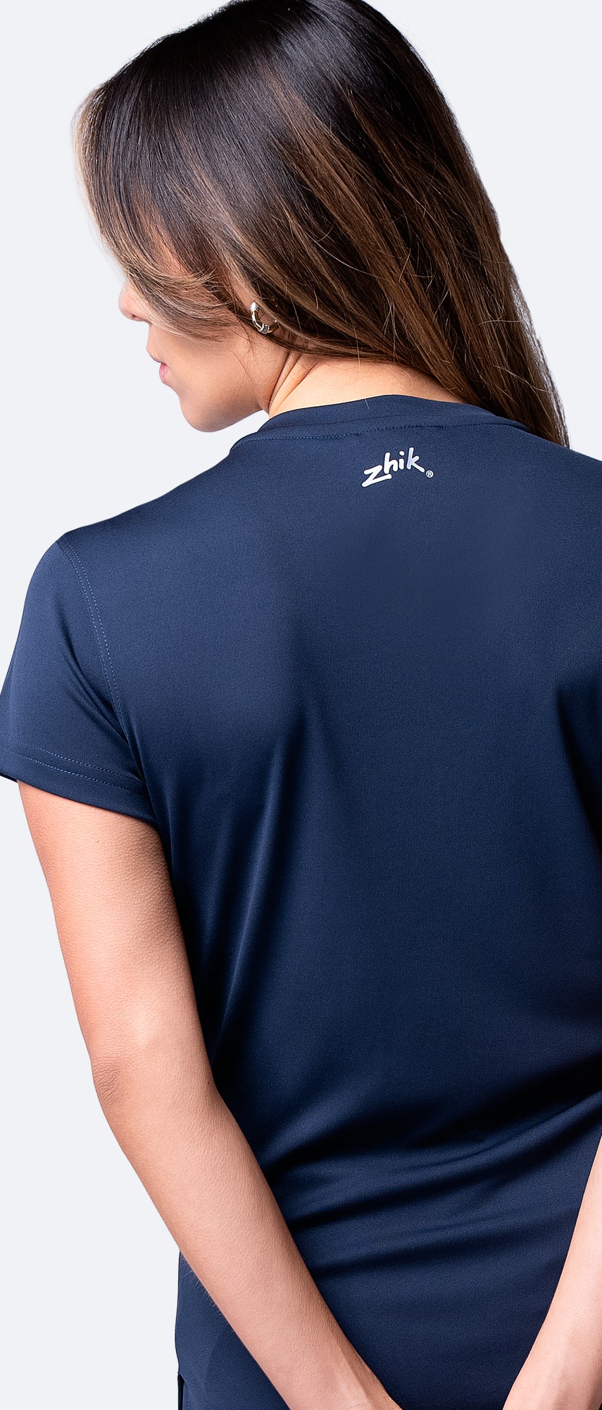 Detailed back view of navy Zhik Women's UVActive Short Sleeve Top, showing high-gauge fabric and breathable design.
