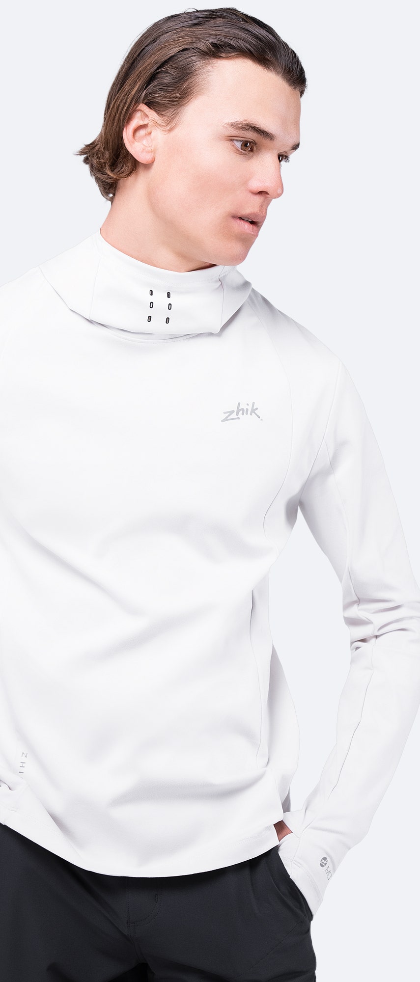 Model wearing Platinum ZhikMotion™ Hooded Top, featuring 4-way stretch, moisture-wicking fabric, and thumb loops for secure layering.