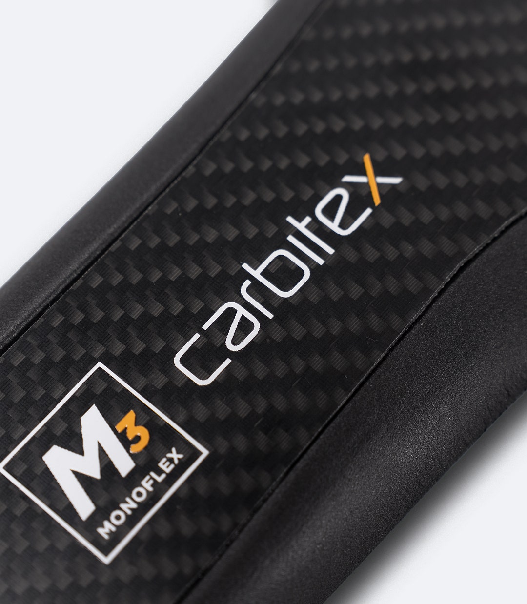 Close-up of Carbitex® M3 Monoflex logo on black Zhik Hiking X Carbon Insole, indicating premium carbon technology