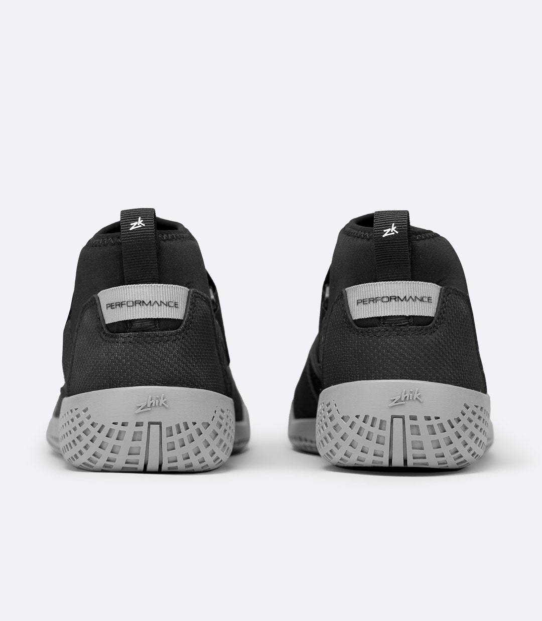 Rear close-up of Zhik Performance Ankle Boots in black, showing heel overlays and rubber-coated back panels