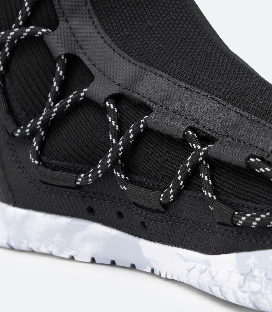 Close-up of Zhik Lightweight High Cut X Boot in Black with full-length side lace system for secure, precise fit.