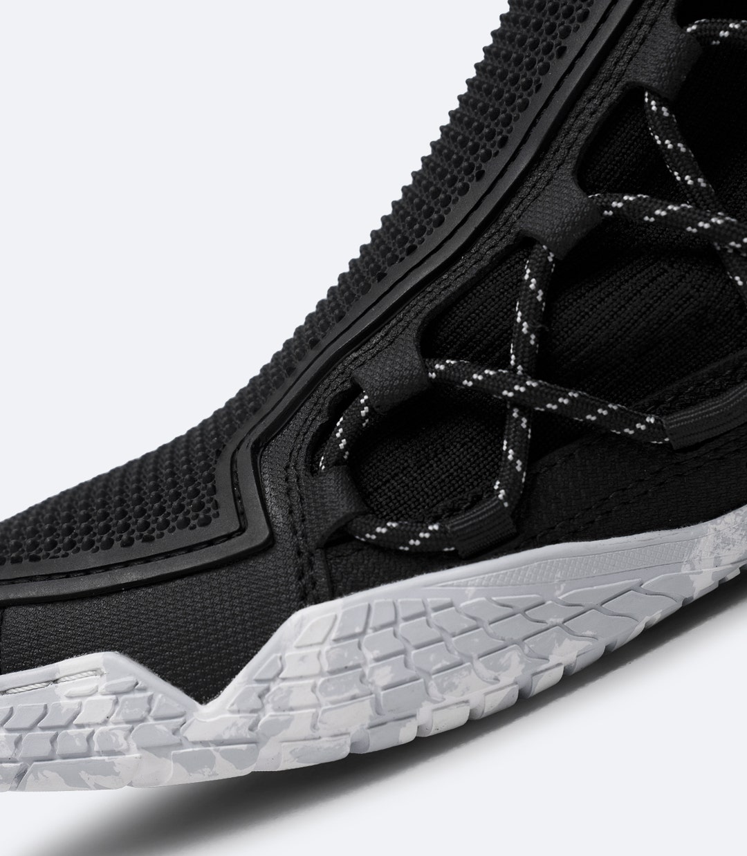 Close-up of black Zhik Hiking X Boot side lace system, showing supportive full-length lacing and flexible knit upper