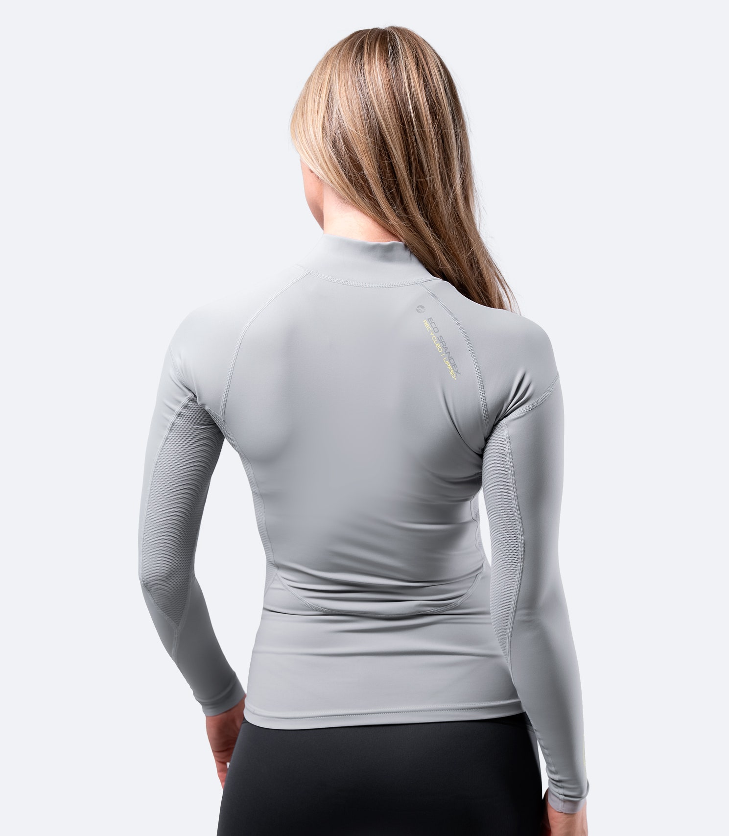 Rear view of Zhik Women's Platinum Eco Spandex Top showing anti-rash flatlock stitching and bar-tacked junctions for added durability.