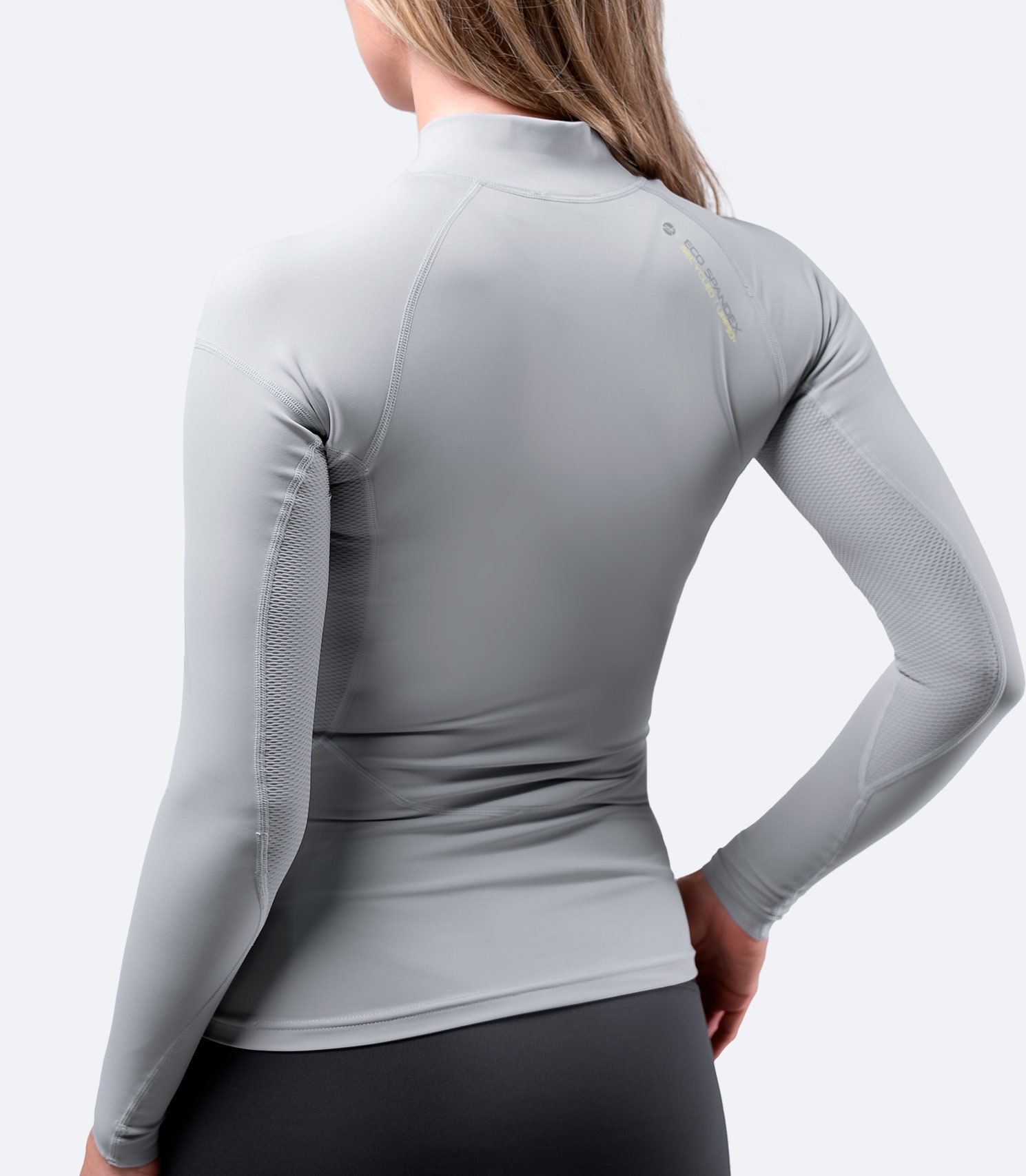 Rear view of Zhik Women's Platinum Eco Spandex Top showing anti-rash flatlock stitching and bar-tacked junctions for added durability.