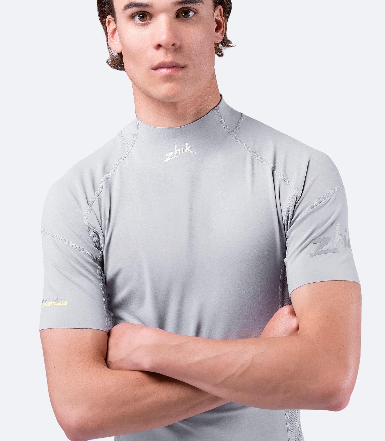 Front view of Zhik Men's Platinum Eco Spandex Top, featuring 240GSM recycled fabric with 4-way stretch and UPF 50+ sun protection.