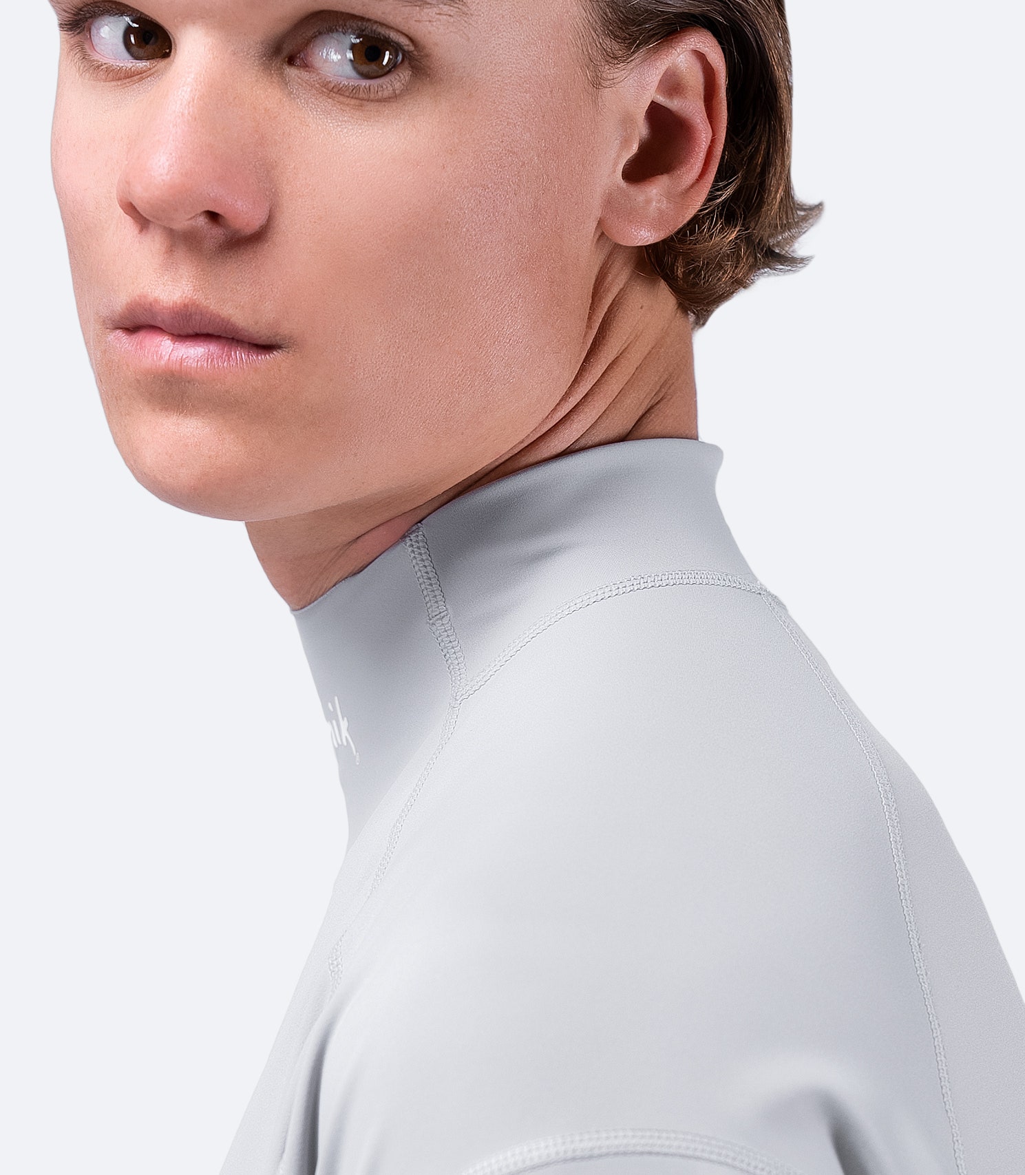 Close-up of Platinum Eco Spandex Top collar, showing soft-touch fabric and reinforced seams for durability.