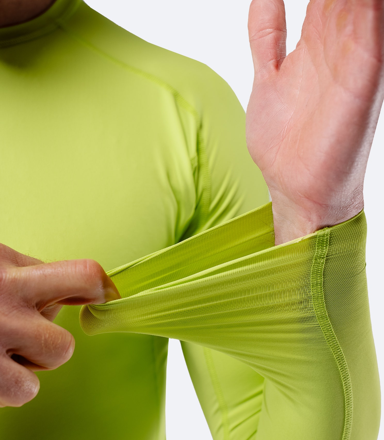 Close-up of fabric stretch detail on Men’s Eco Spandex LT Long Sleeve Baselayer Top