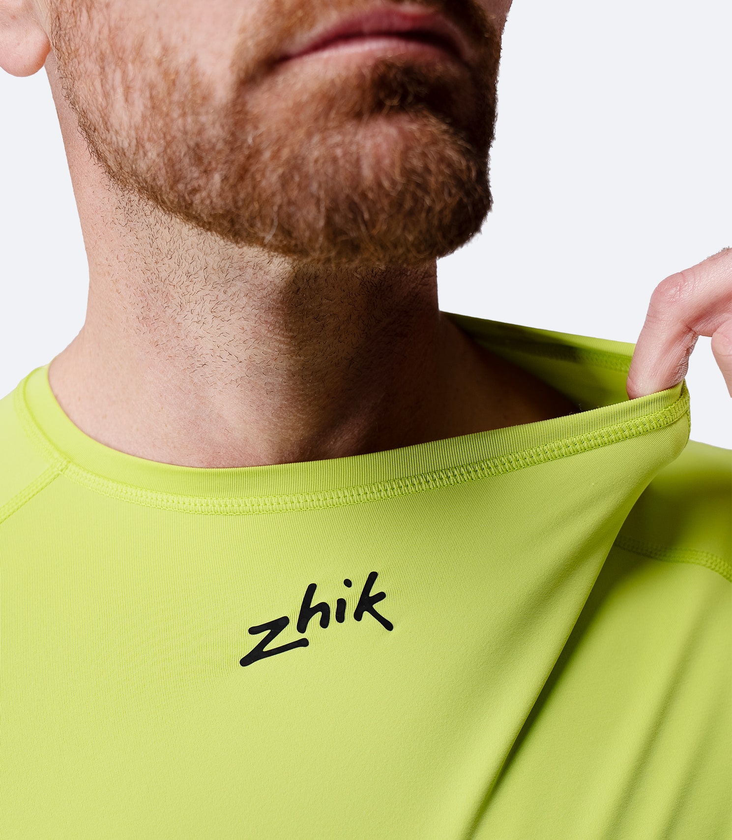 Close-up of collar with Zhik logo on Men’s Eco Spandex LT Long Sleeve Baselayer Top