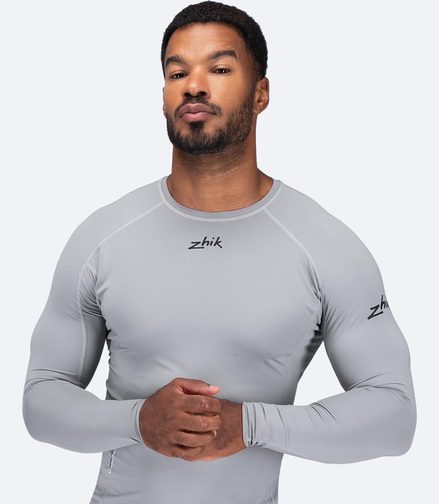 Zhik Men's Eco Spandex LT Long Sleeve Baselayer Top in Platinum, lightweight recycled fabric with UPF 50+ sun protection.