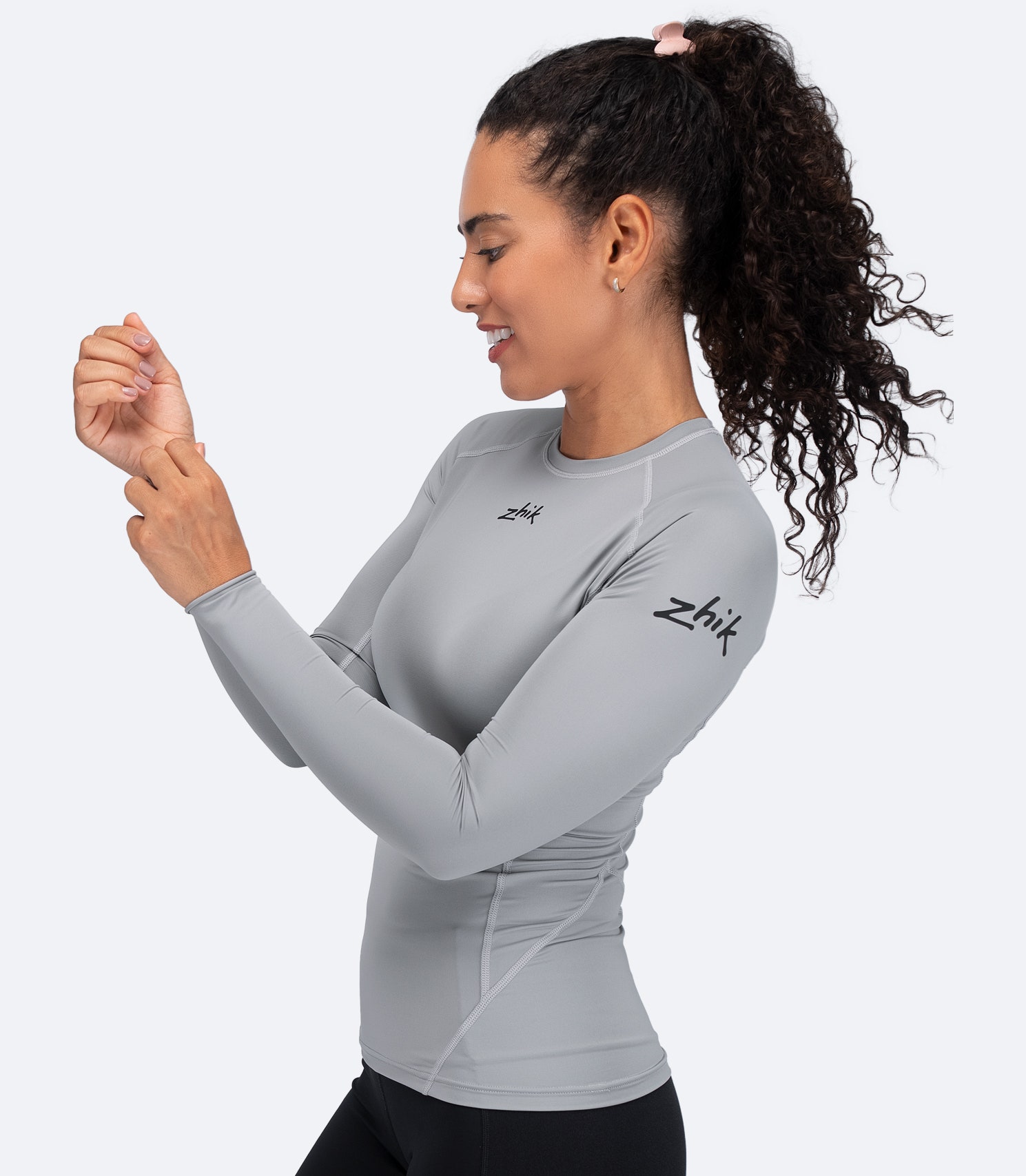 Zhik Women's Platinum Eco Spandex LT Top side view showing lightweight, flexible fit for paddling performance.
