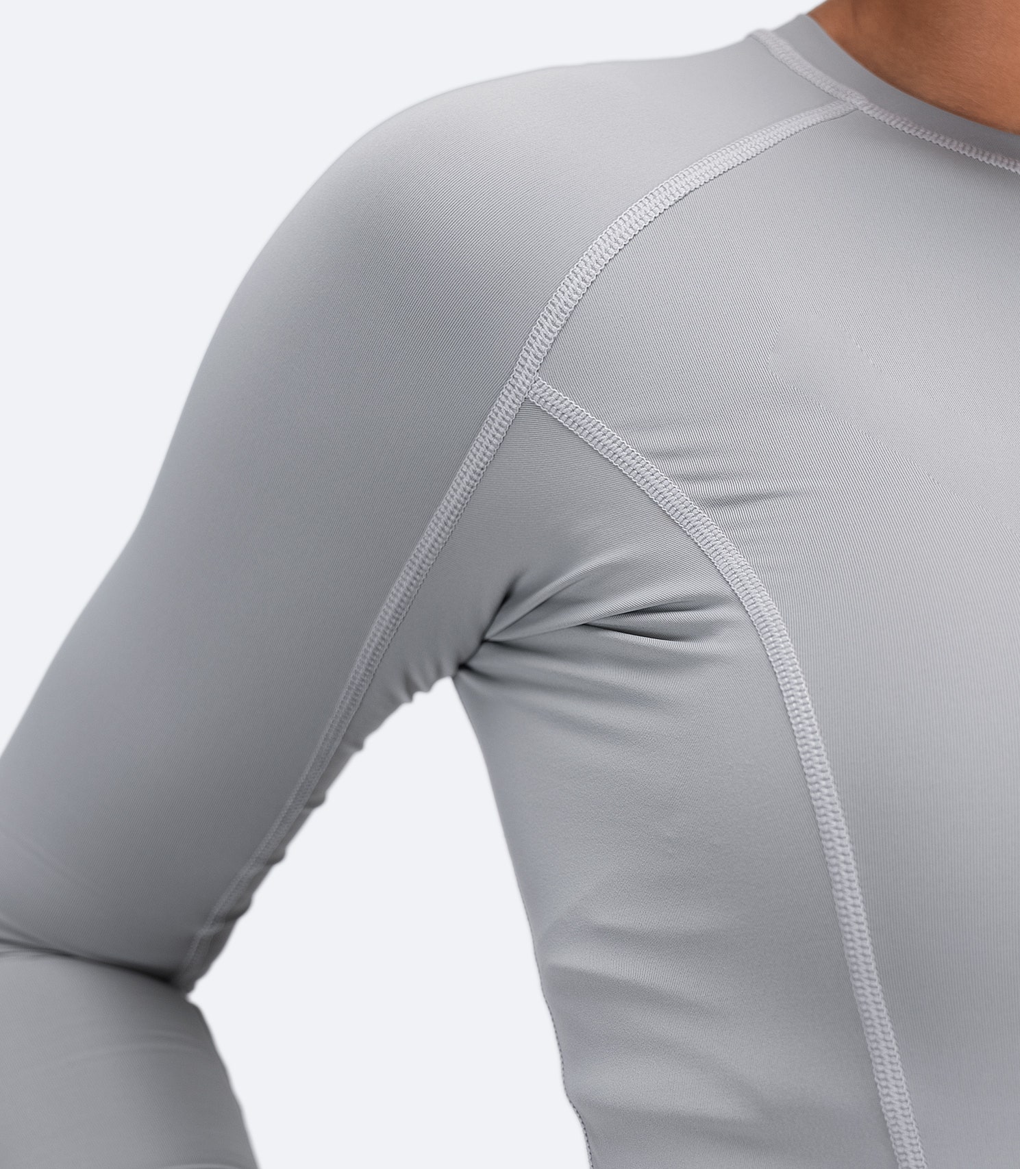 Underarm close-up of Zhik Platinum Eco Spandex LT Top showing flatlock stitching for anti-rash comfort.