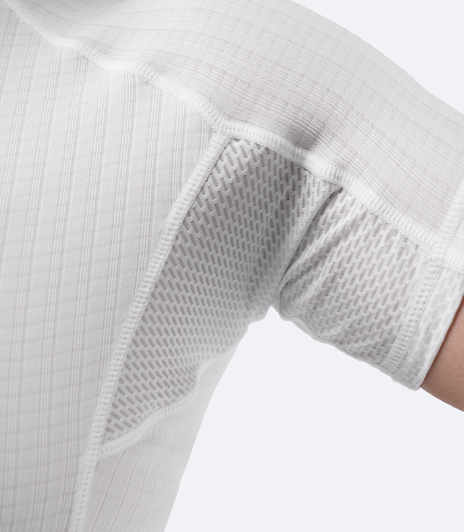 Close-up of grid-knit fabric texture on sleeve of Women’s Active Baselayer Top