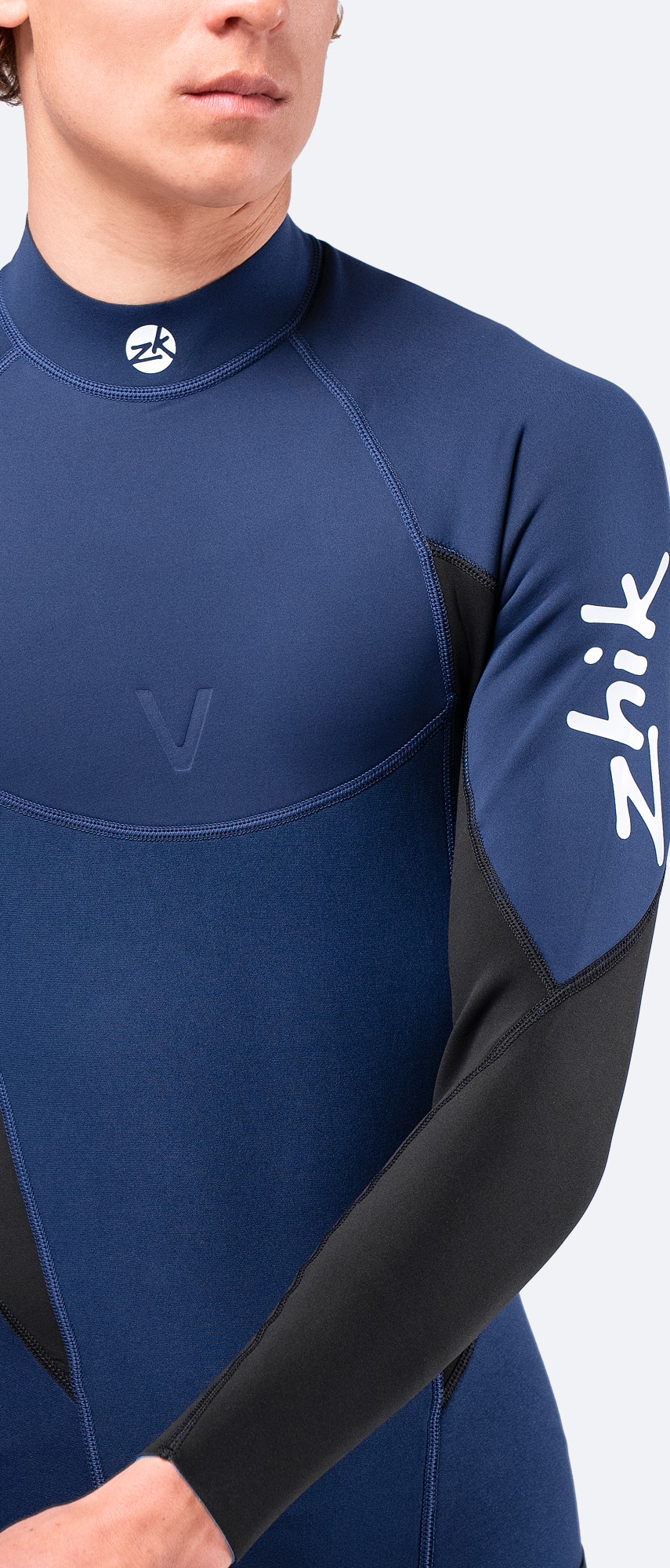 Close-up of the upper torso and collar of the navy Microfleece™ V Top, showing high-stretch neoprene and fleece lining.