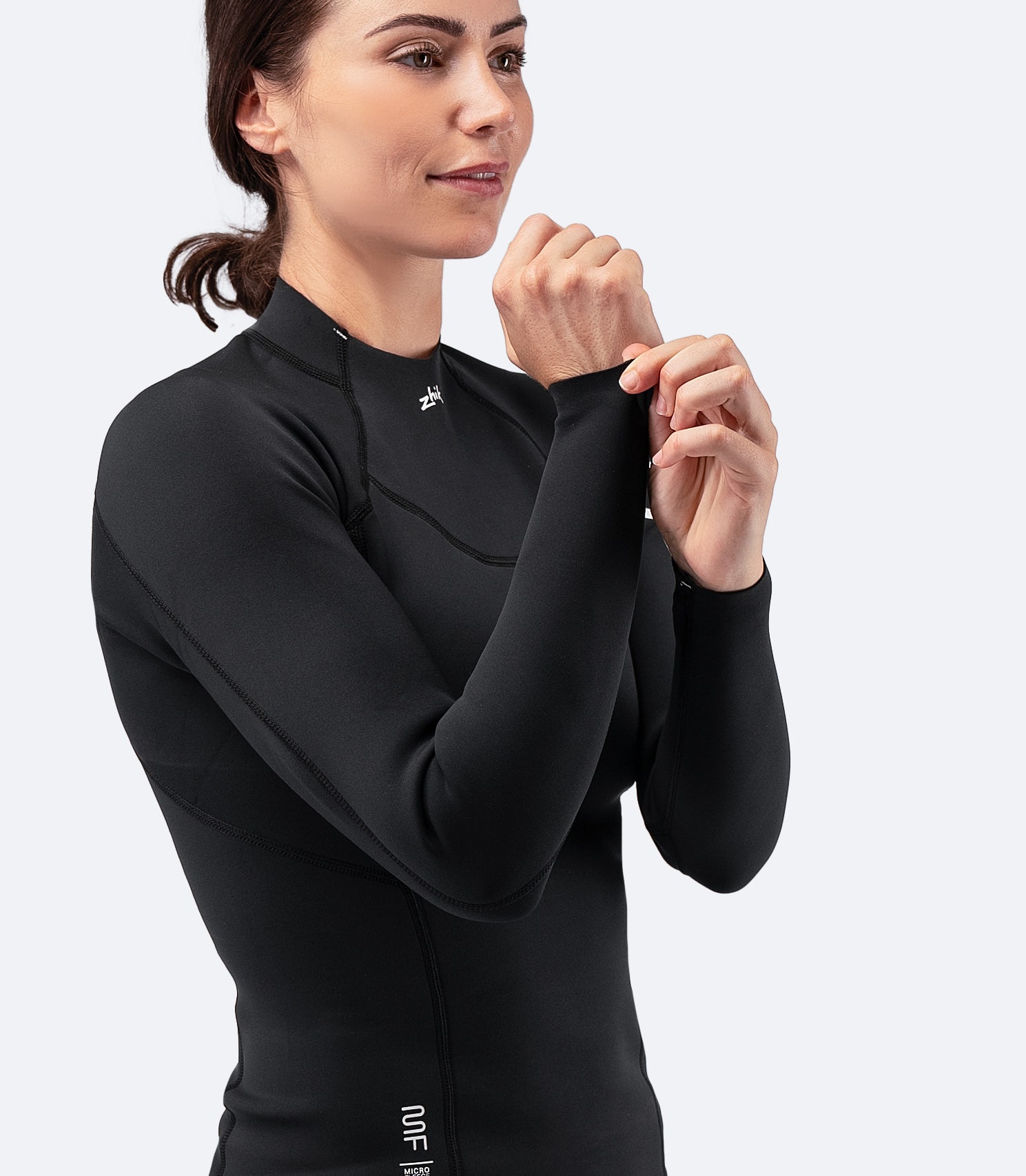 Close-up of Zhik Women's Microfleece Top showing wrist area, highlighting stretch fabric for flexibility and ease of movement