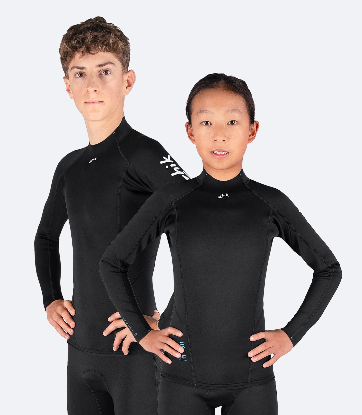 Zhik Youth Microfleece Top in black with 2/1mm Microfleece™ neoprene insulation, offering comfort and flexibility for young sailors.