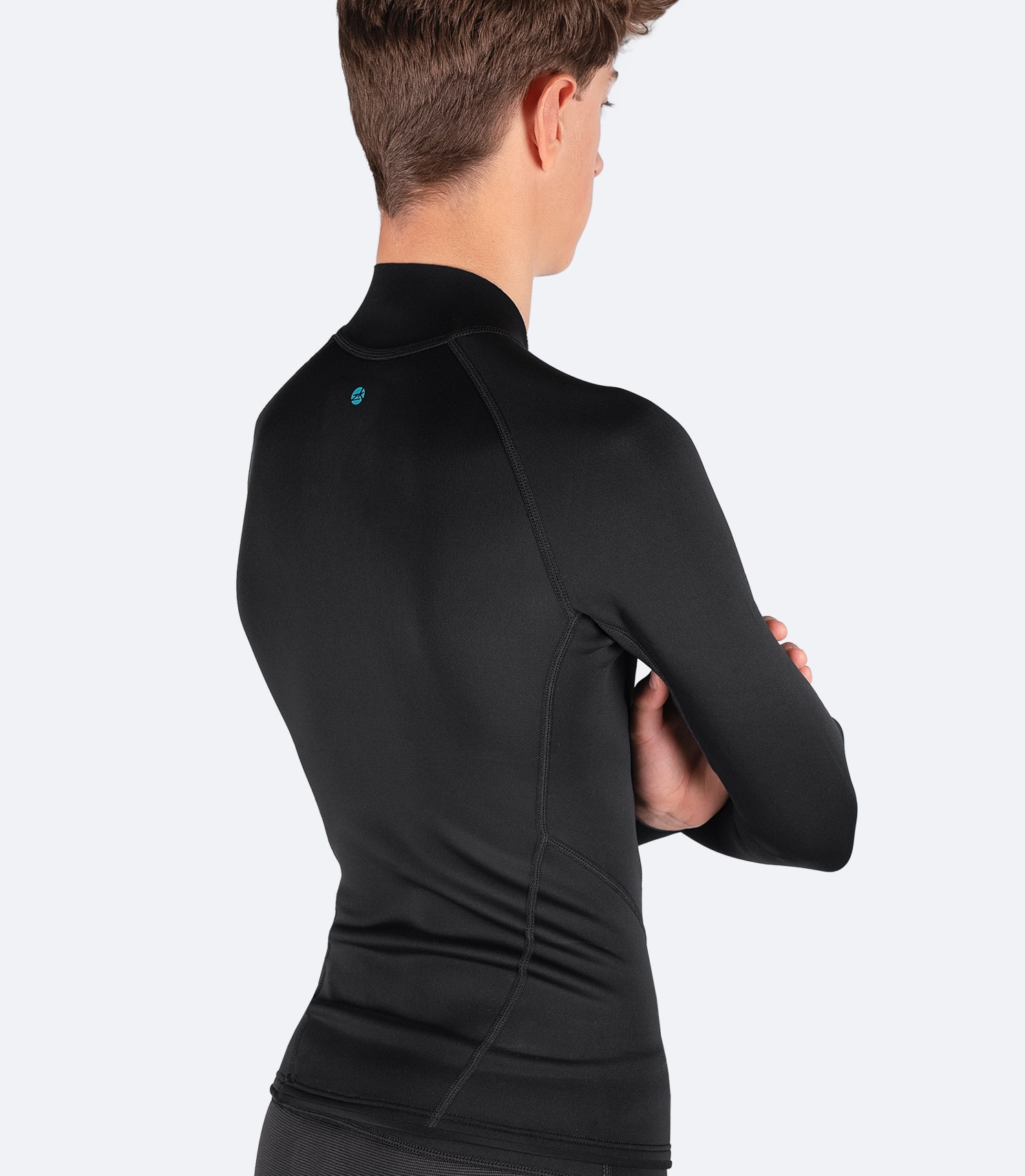 Back view of Zhik Youth Microfleece Top showing high-stretch material and flatlock seam construction for enhanced durability and comfort.