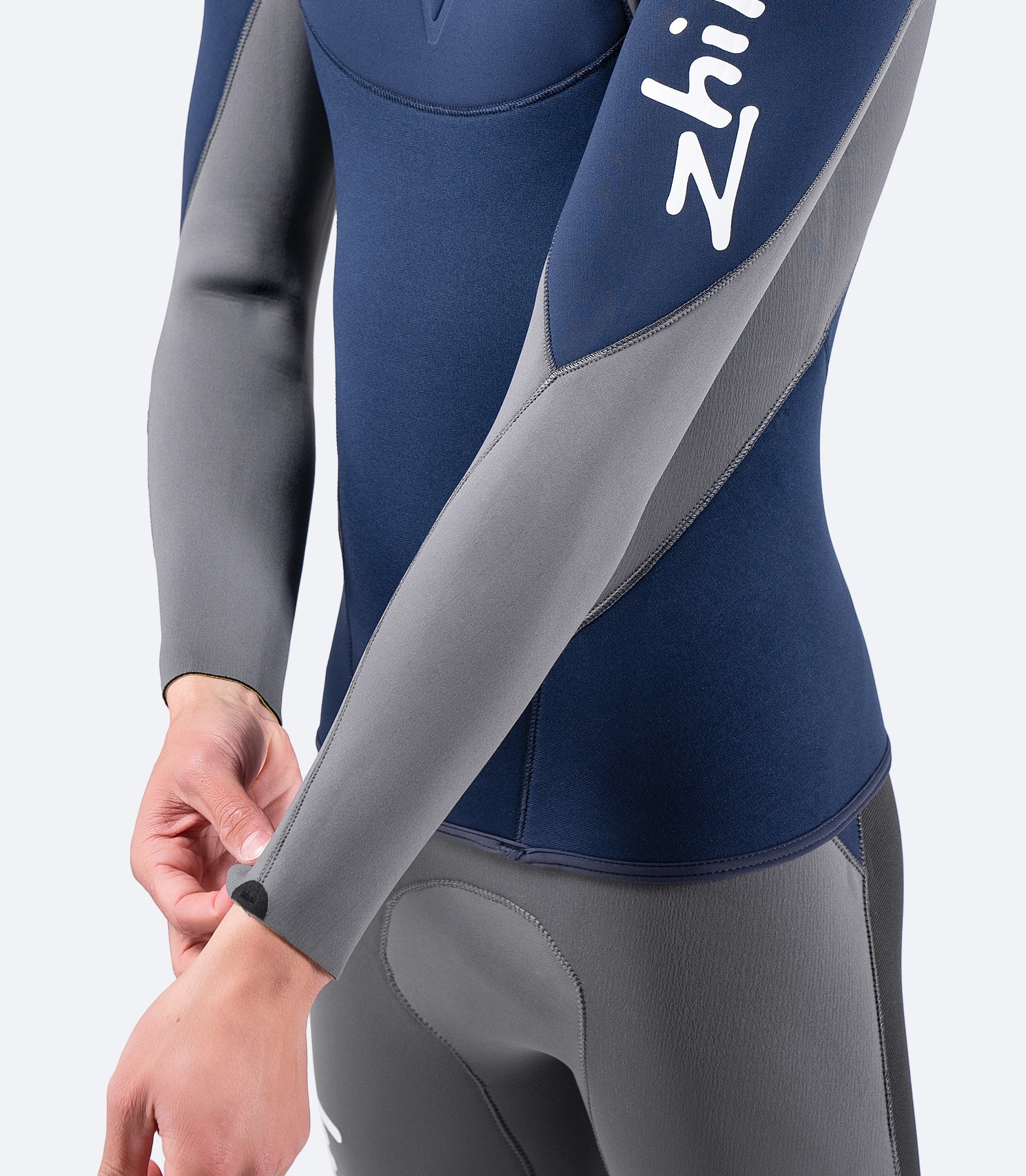 Close-up of navy Superwarm® V Top’s arms, showing secure fit and waterproof blind-stitched seams for protection.