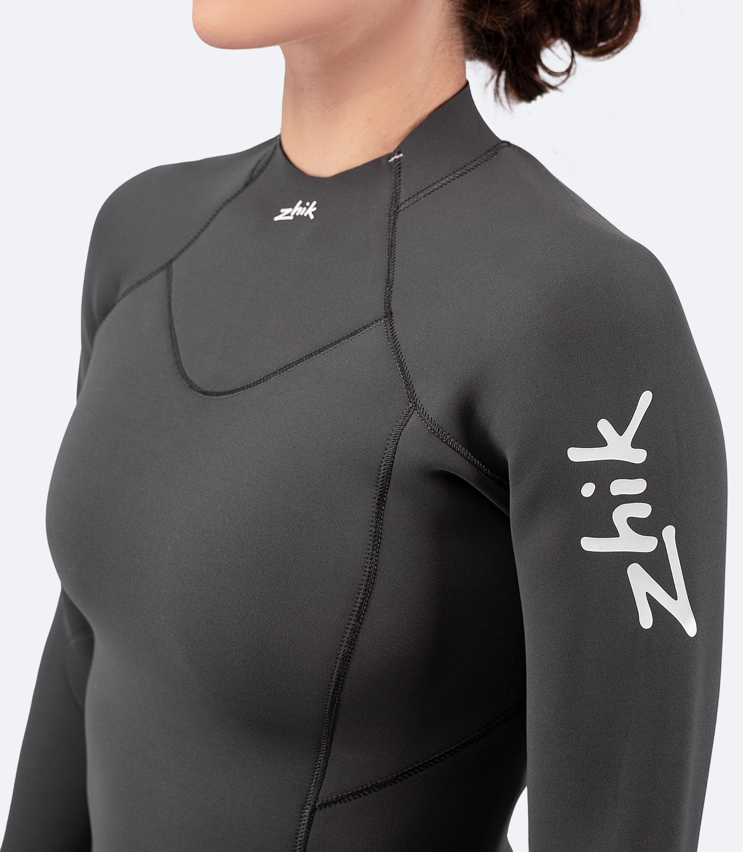 Close-up of Zhik Women's Superwarm Top detailing the precise stitching, blind-stitched seams, and smooth neckline for a comfortable, water-tight fit