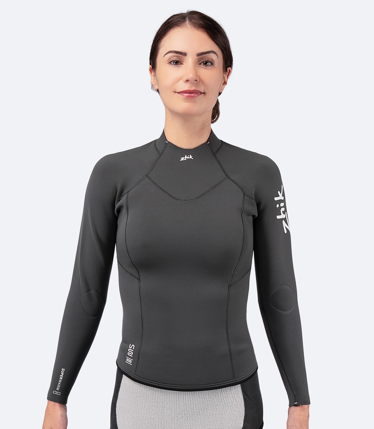 Zhik Women's Superwarm Top in dark grey, featuring 3mm thermal insulating neoprene and fast-drying Hydrobase® inner lining