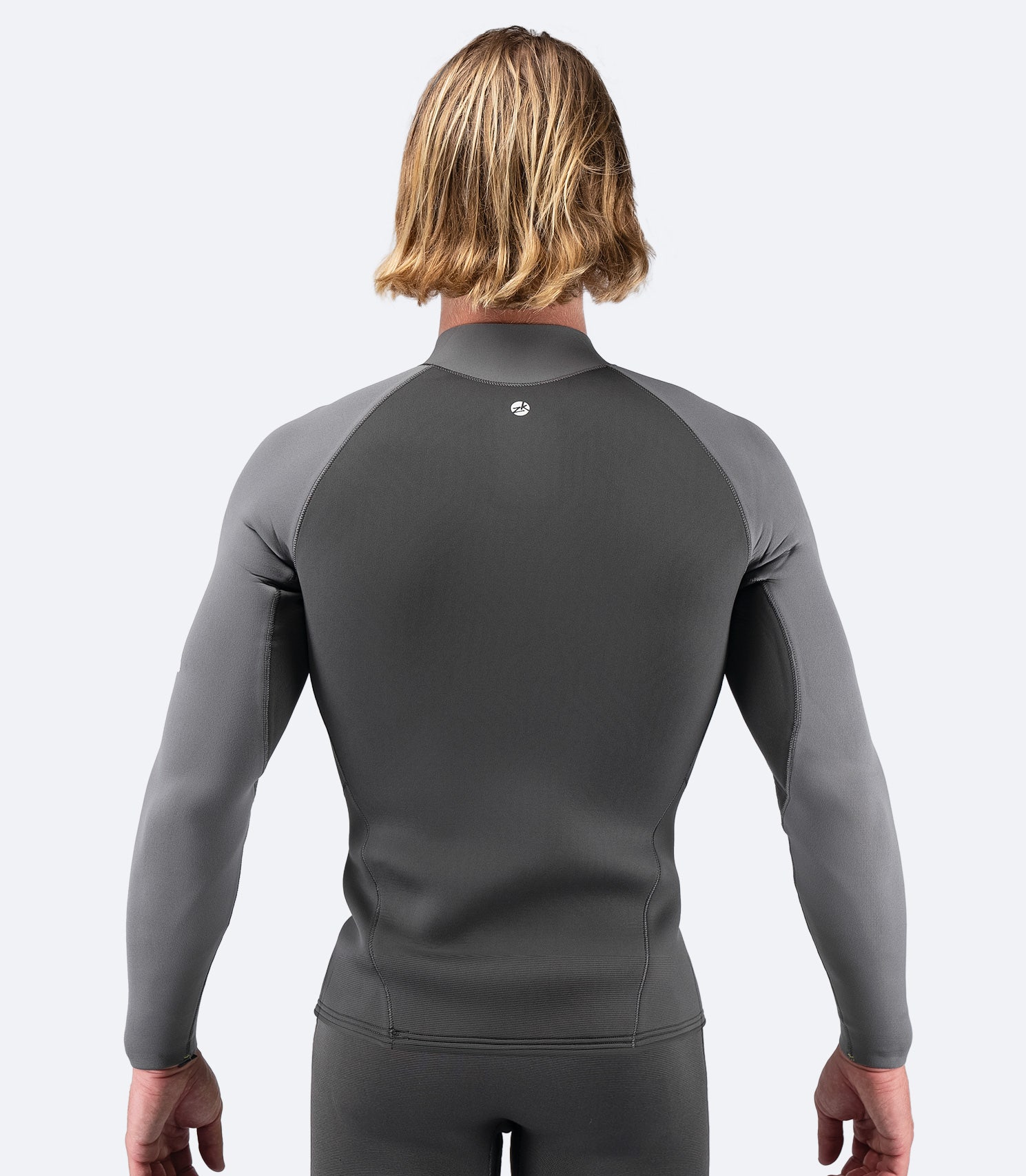 Back view of Men's SuperwarmX Top in black, showcasing flexible stretch panels and ergonomic design for maximum comfort