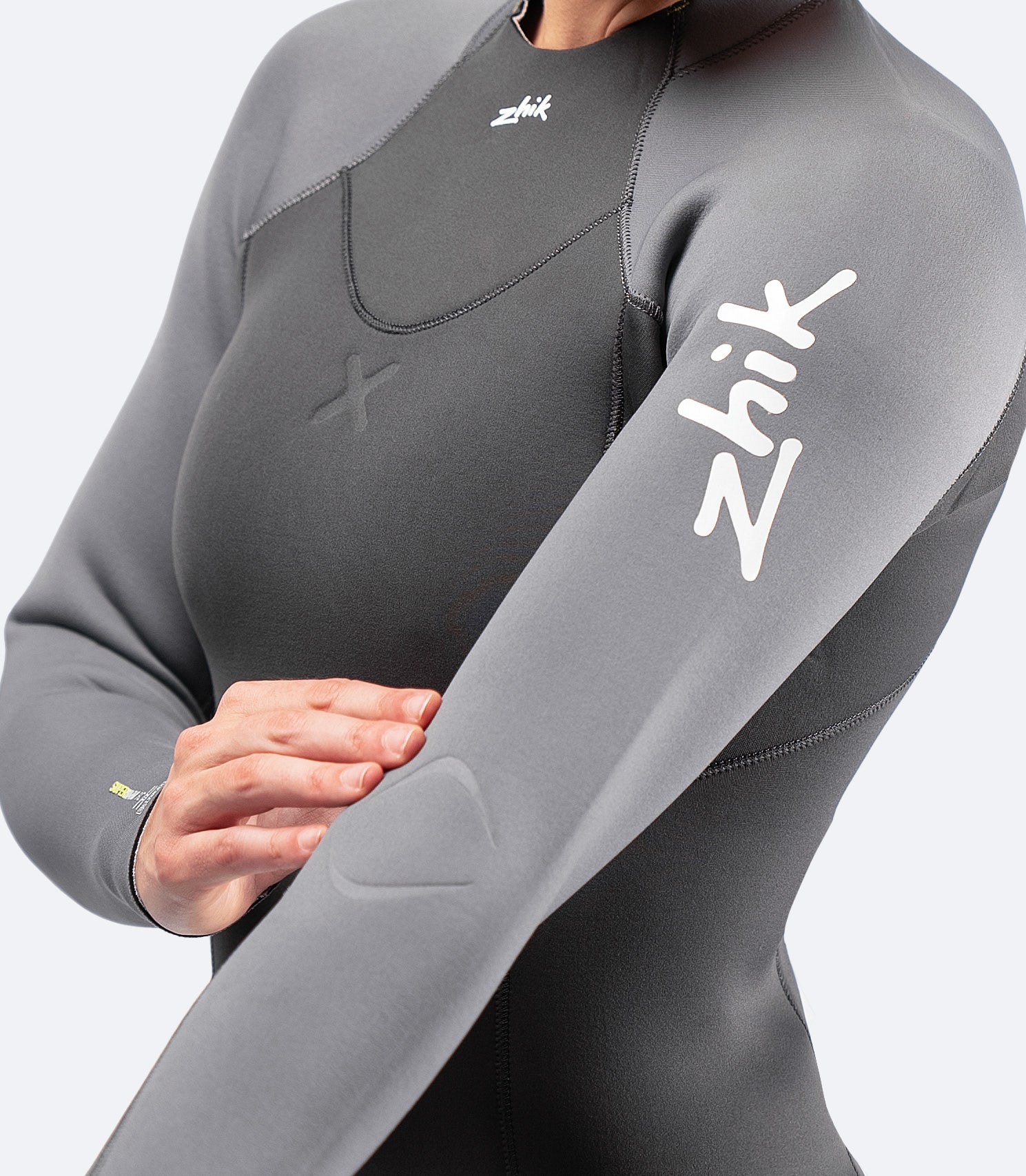Close-up of Zhik Women's SuperwarmX Top fabric, featuring thermal fleece lining for warmth.