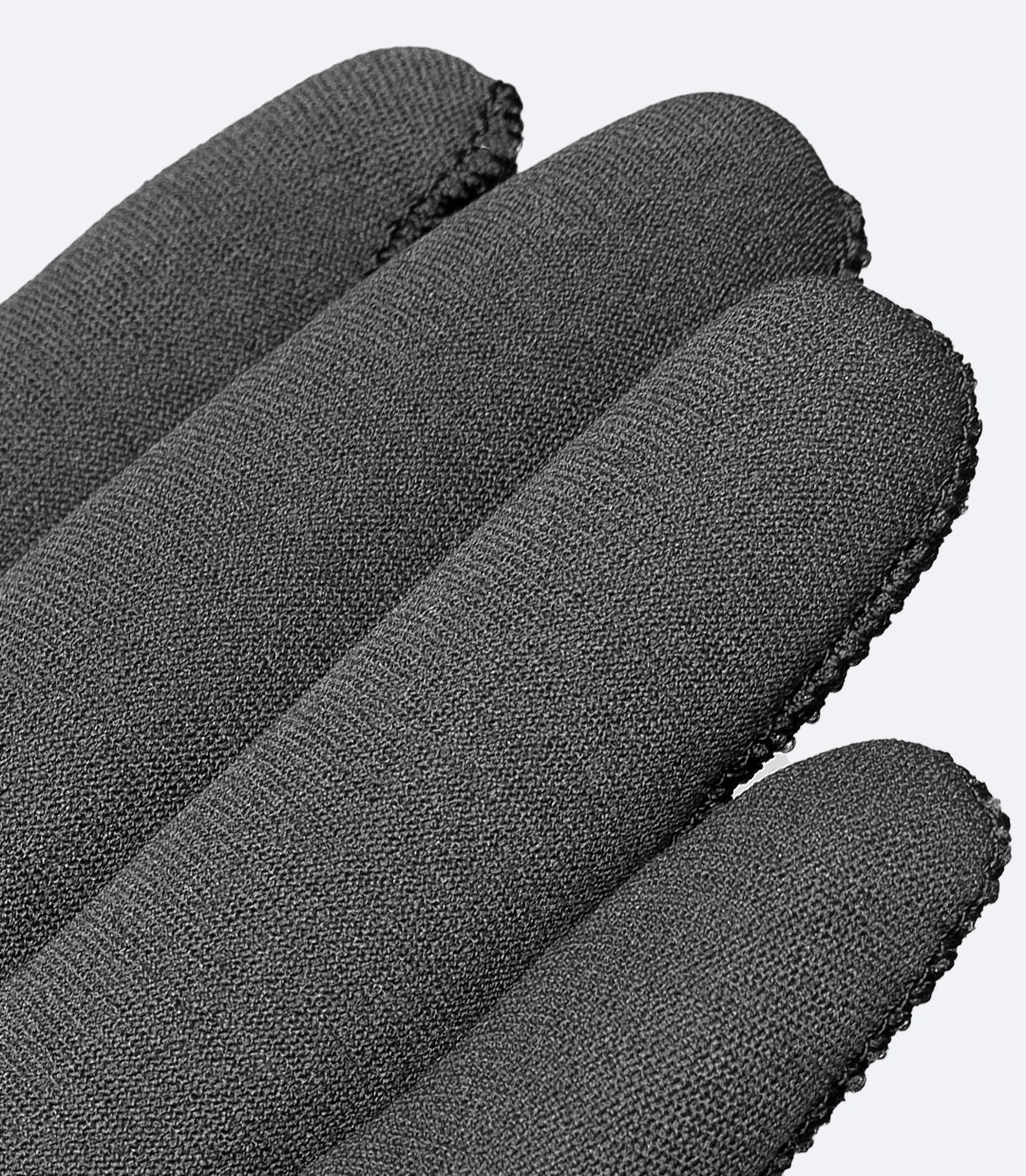 Close-up of Zhik Superwarm Gloves showcasing glued and blind-stitched seams for enhanced durability and waterproofness