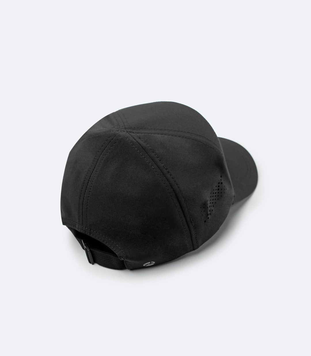 Back view of Zhik Sports Cap in black, showing adjustable straps with an unlockable clip for fine-tuned fit and easy hanging