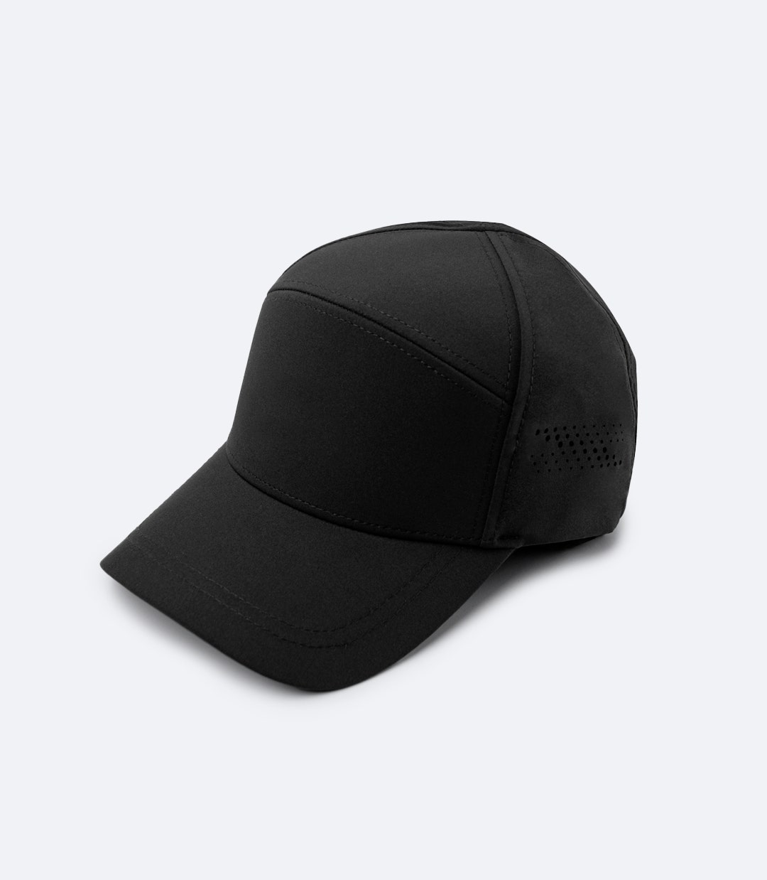 Side view of Zhik Team Sports Cap in black, highlighting soft inner headband, anti-glare brim, and durable fabric for comfort