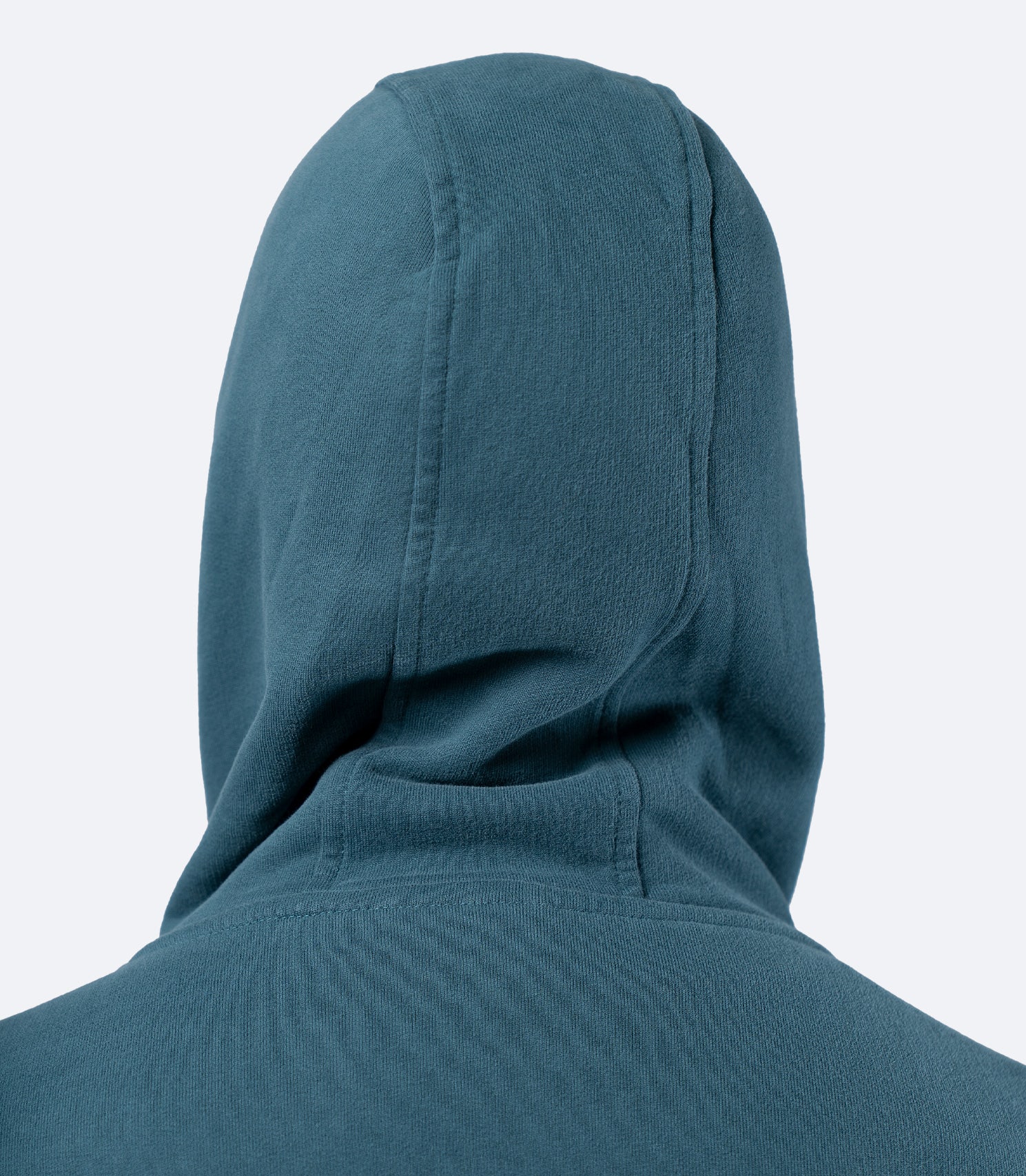 Close-up rear view of Deep Teal Zhik Men's Carbon Hoodie hood, showing smooth premium cotton finish