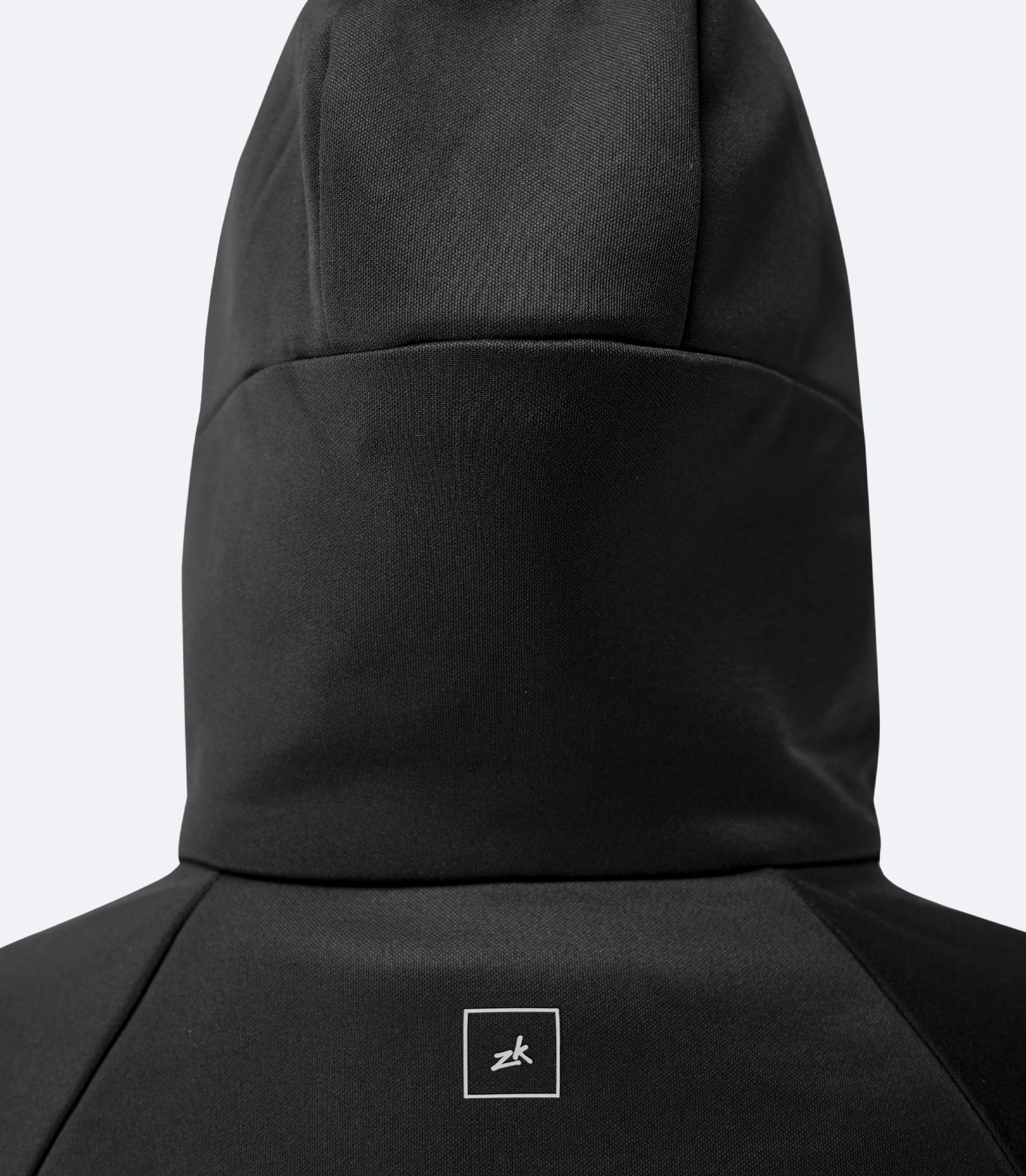 Close-up of back hood detail on Zhik Women’s Thermo TechFleece Hooded Jacket in black