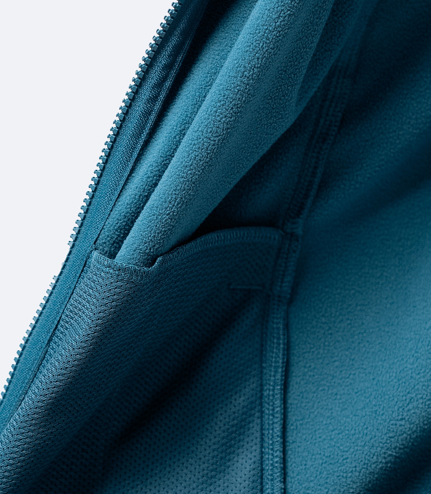 Internal stash pocket of provincial blue Zhik Tech Hoodie, designed for discreet storage of essentials.