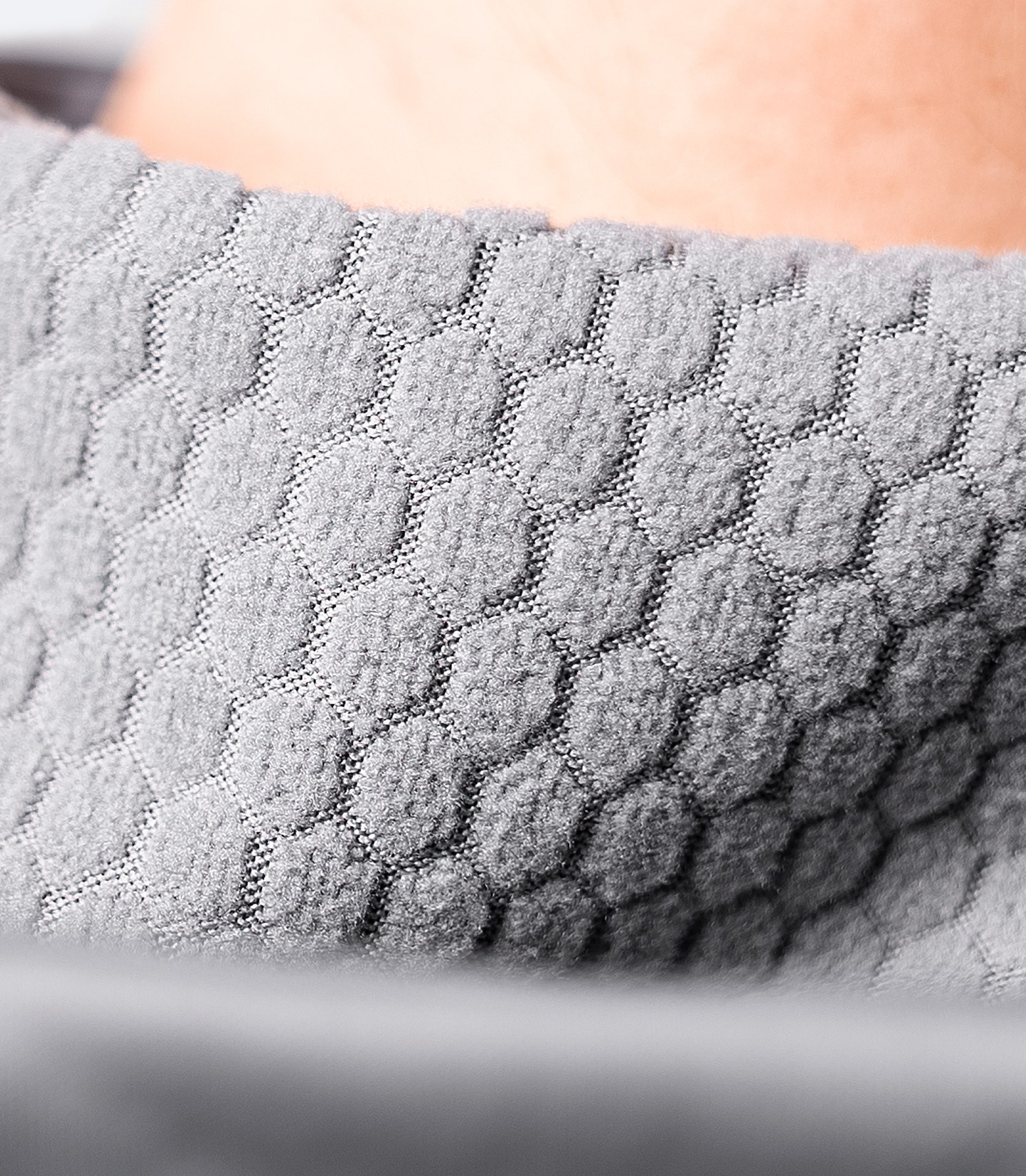 Close-up of the interior hood on the platinum Zhik Women's Tech Hoodie, showcasing soft lining and durable construction.