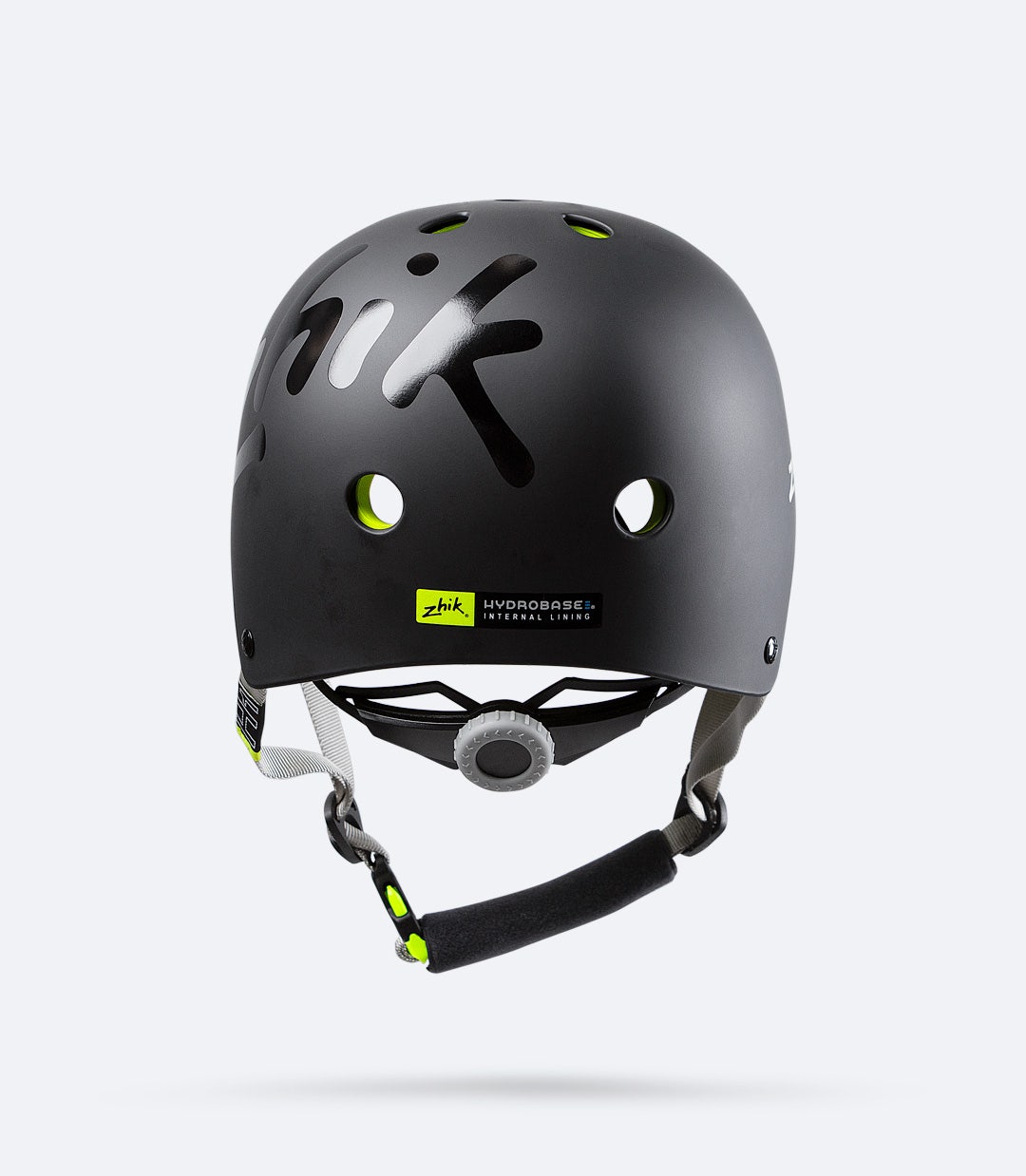 Back view of black Zhik H1™ Helmet featuring an adjustable fit cog and airflow channels for cooling and quick drainage.