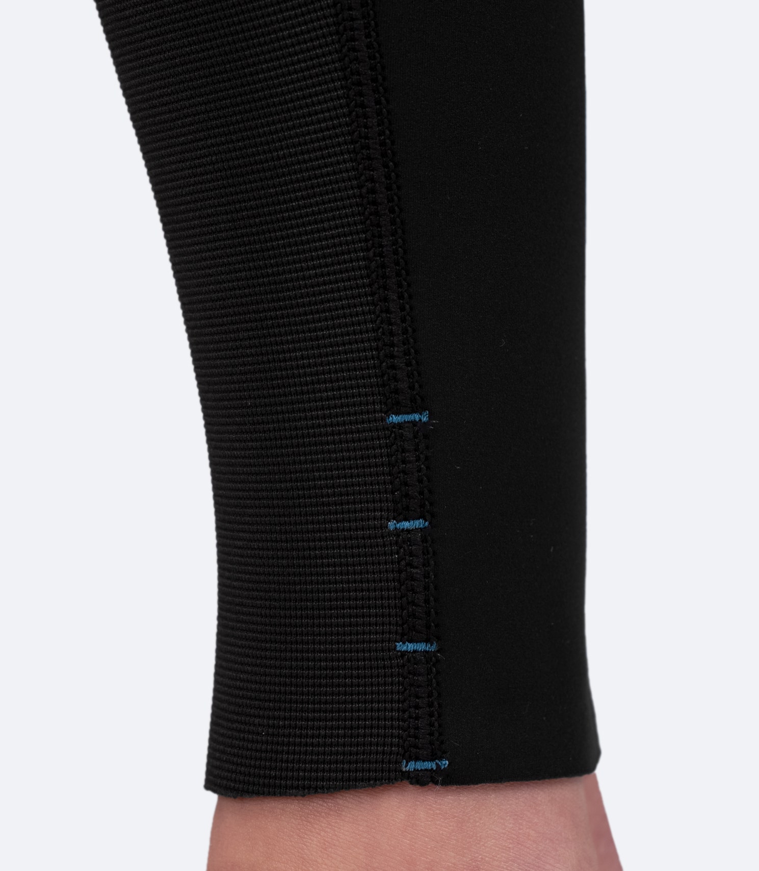 Zhik Women's Microfleece Hiker with adjustable leg length, ready-to-cut bar tacks, and drainage holes to expel trapped water