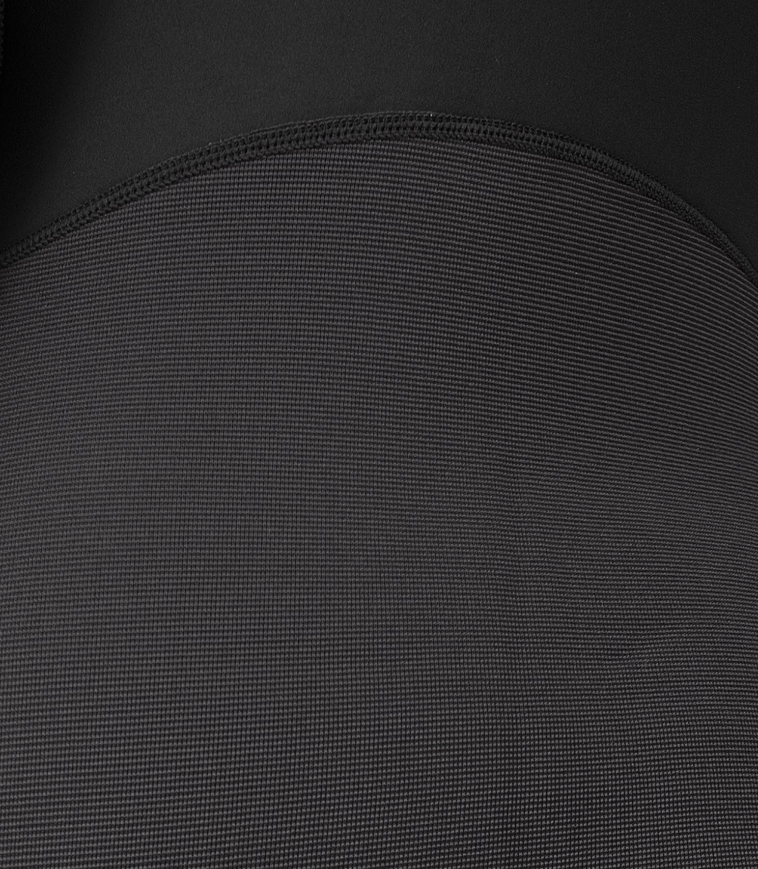 Close-up of Zhik Women's Microfleece Hiker seams, showing flatlock stitching, stress point tape, and ZhikTex™ II abrasion protection on seat and legs
