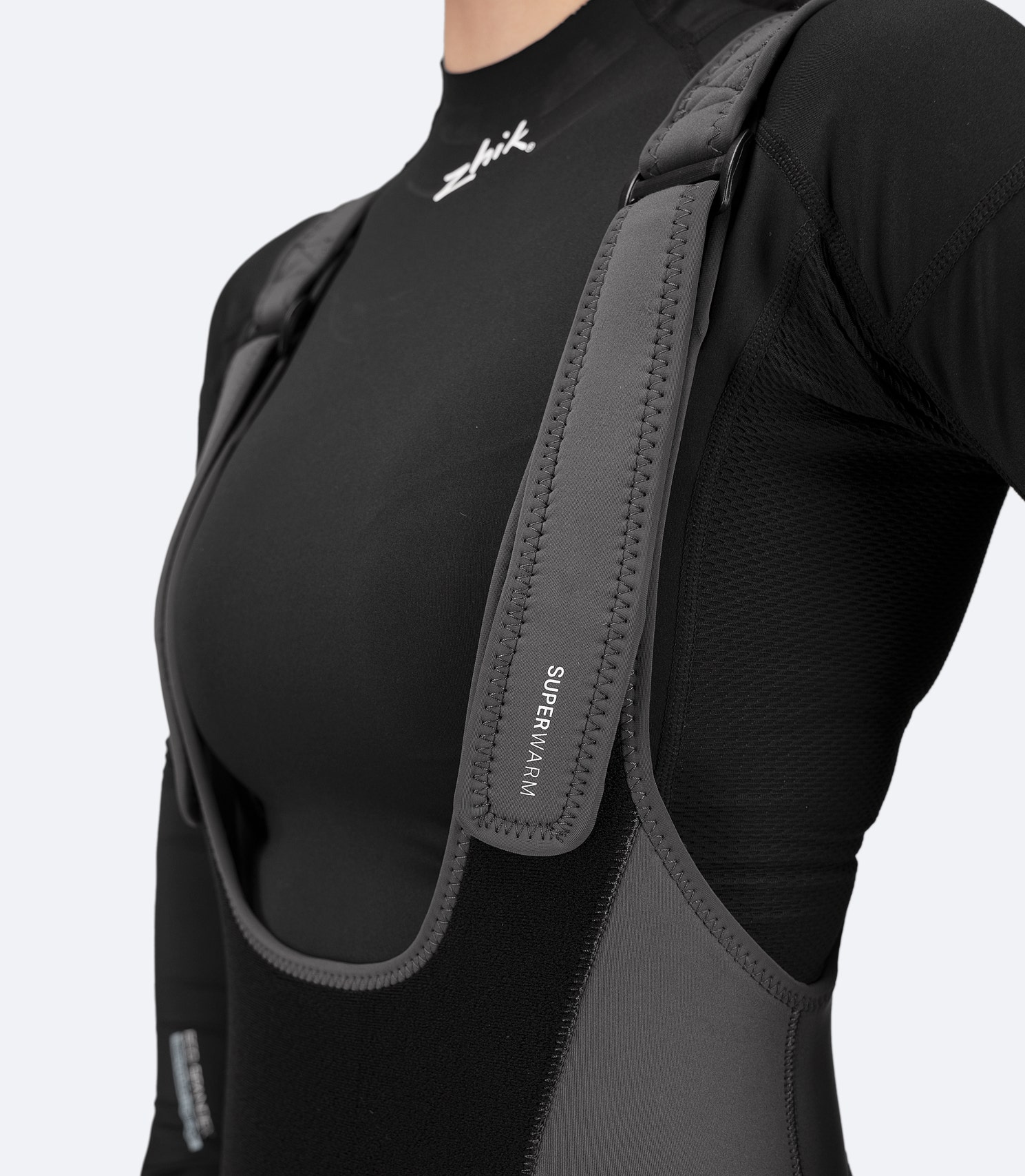 Close-up of Zhik Women's Superwarm® Hiker, featuring Velcro® chest panel and adjustable straps for a secure, universal fit