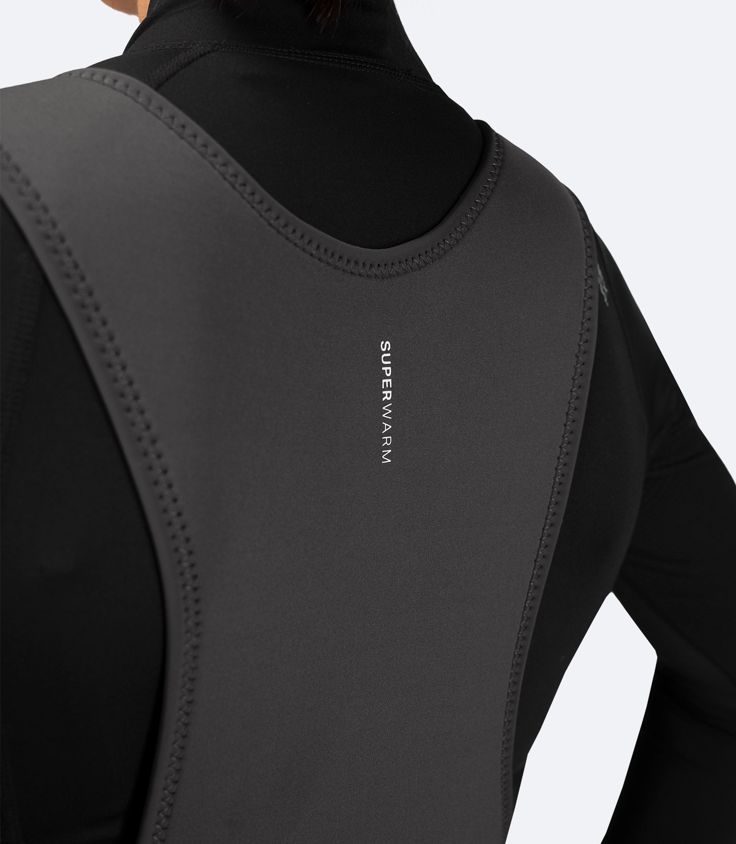 Close-up rear view of Zhik Women's Superwarm® Hiker, highlighting glued and blind stitched seams with stress point tape and Superwarm® logo