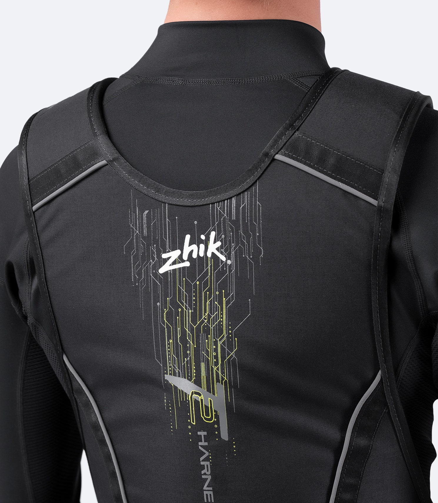 Close-up of black Zhik T2 Trapeze Harness rear, showing adjustable lumbar support and reinforced back panel.