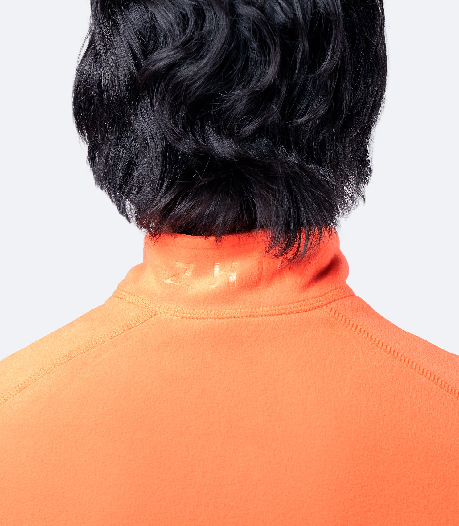 Rear shoulder and collar detail of Men’s Flame Red Full Zip Fleece Jacket, showcasing breathable high-pile microfleece.