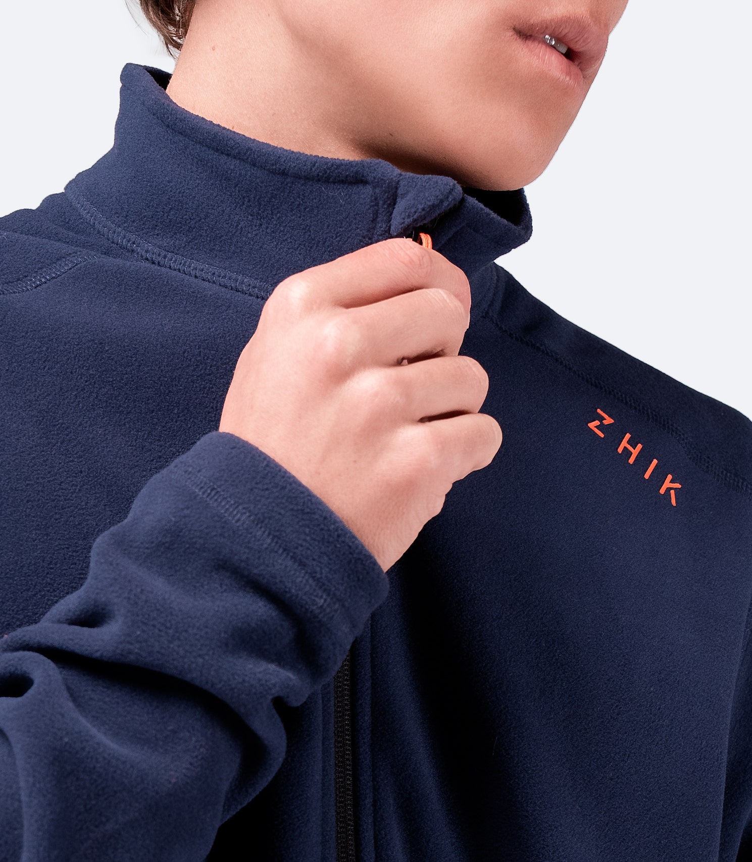 Close-up of Men’s Navy Full Zip Fleece Jacket collar and zipper, showing soft fleece texture and reinforced stitching.