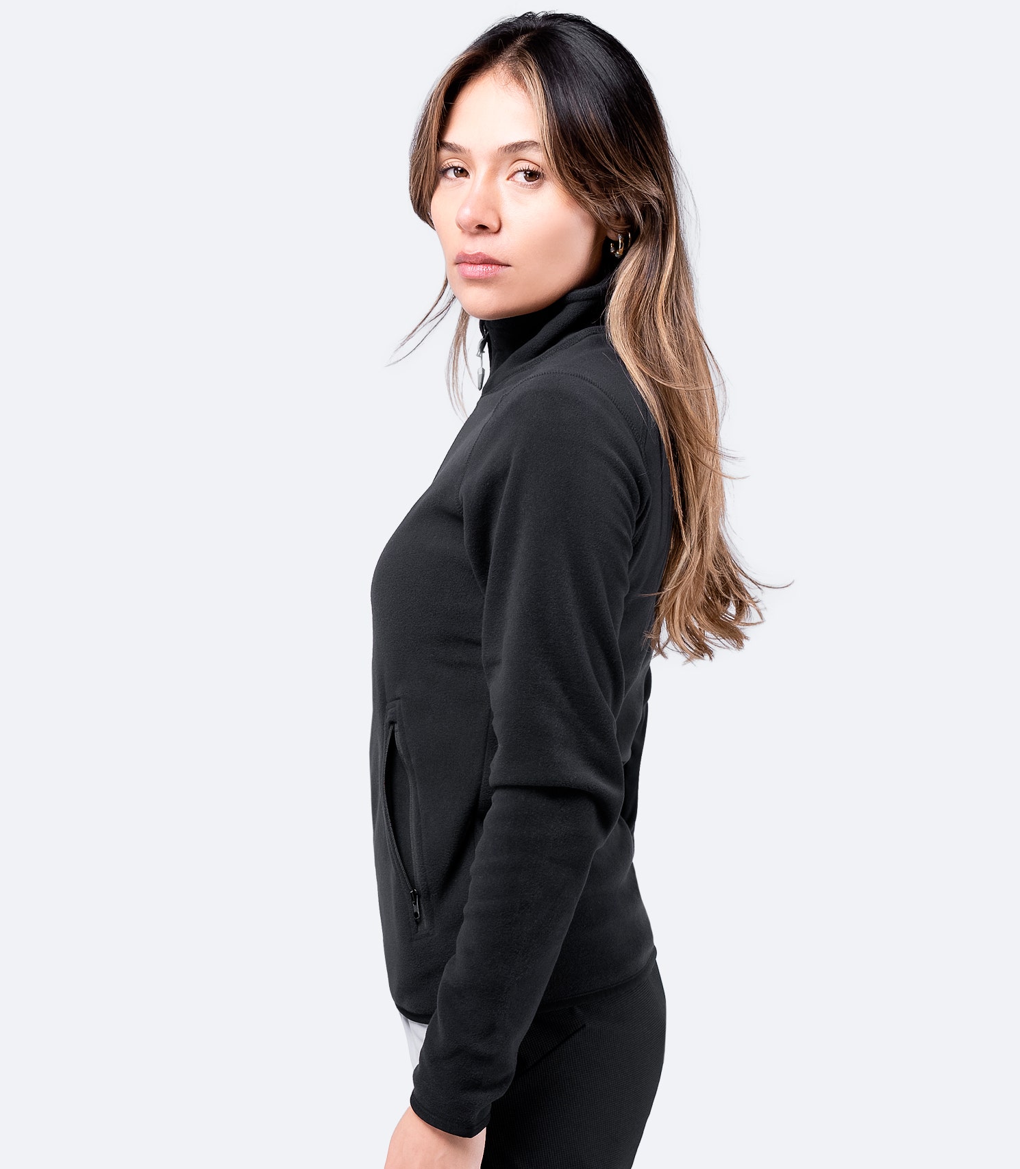 Side view of Women's Black Full Zip Fleece Jacket – breathable, durable microfleece with a sleek fit.