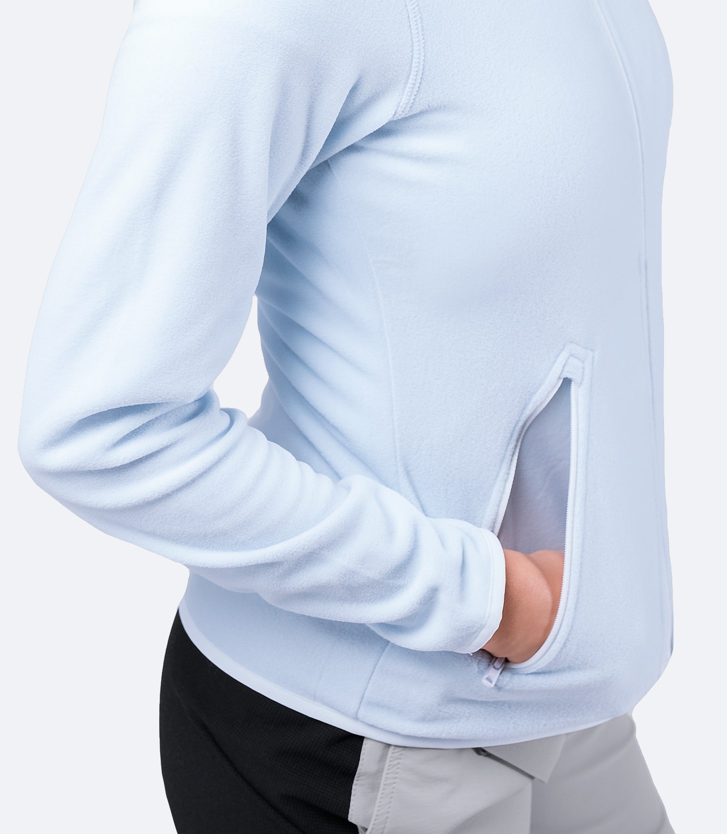 Women's Ice Full Zip Fleece Jacket with hands in pockets – versatile mid-layer for sailing and everyday wear.