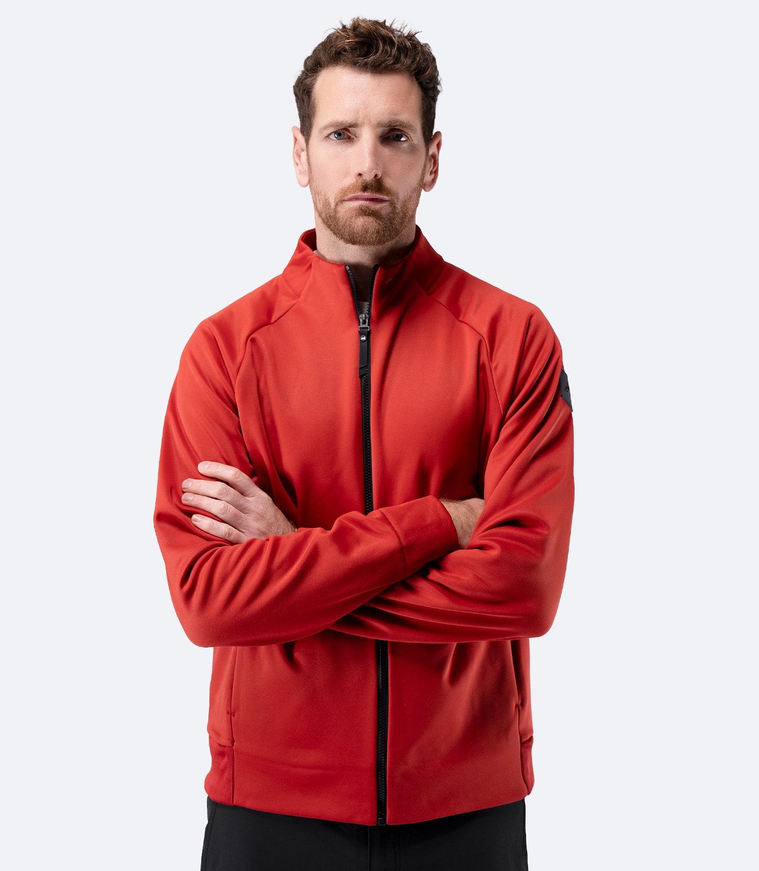 Front view of Zhik Men’s Thermo TechFleece Sports Jacket in garnet red, zipped up