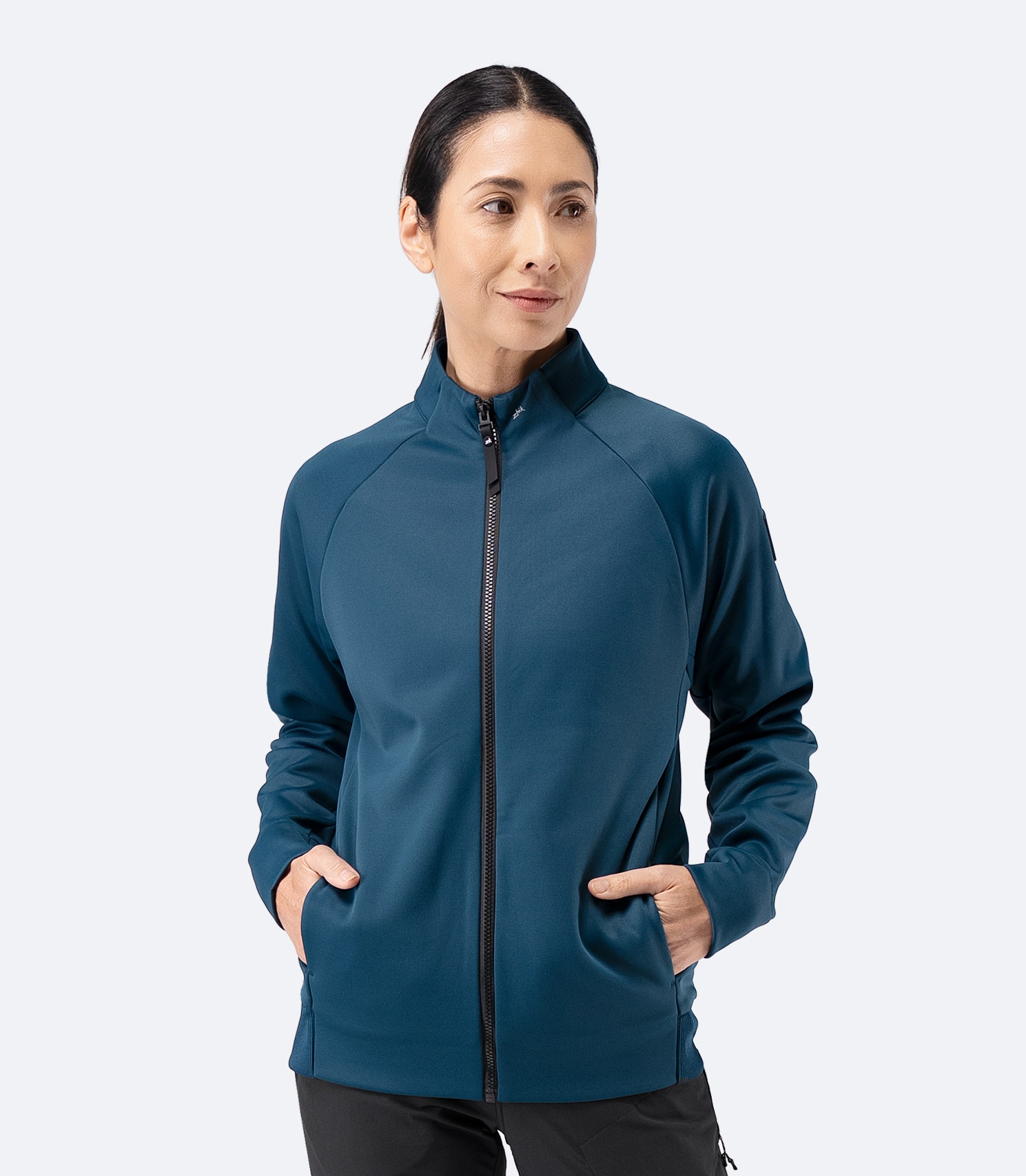 Front view of Zhik Women’s Thermo TechFleece Sports Jacket in deep teal, zipped up