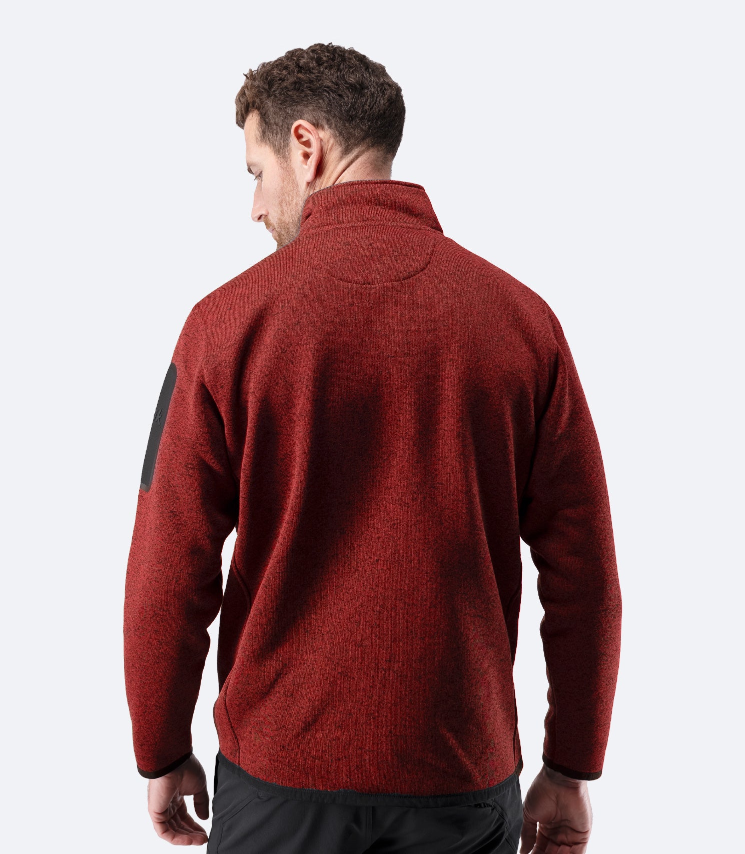 Back view of Zhik Men’s Knit Fleece Jacket in garnet marle with stand collar