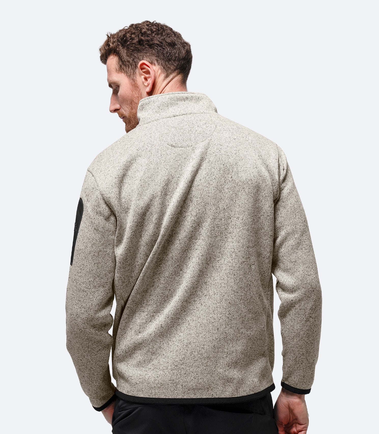 Back view of Zhik Men’s Knit Fleece Jacket in light grey marle with stand collar