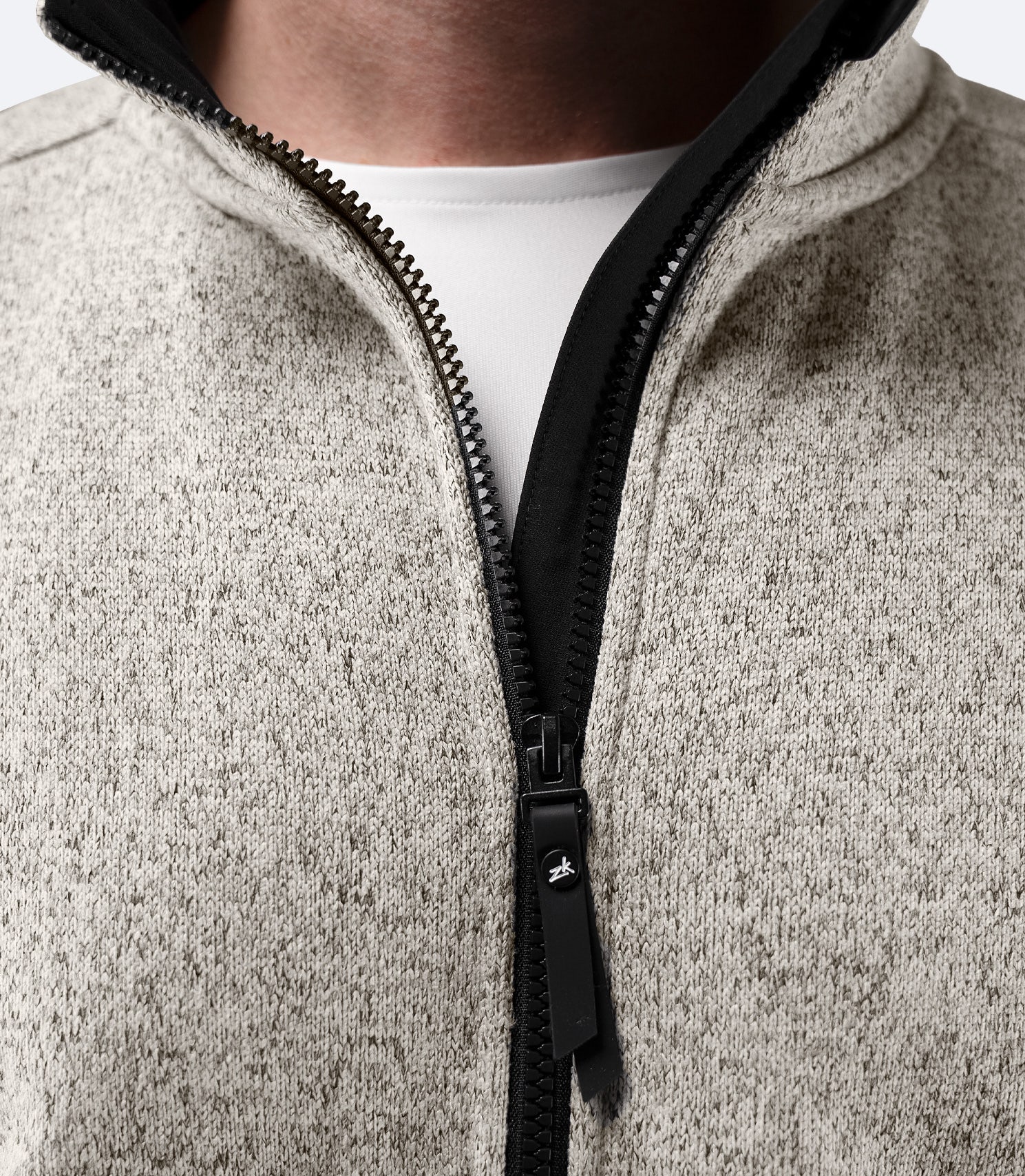 Close-up of front zipper and collar detail on Zhik Men’s Knit Fleece Jacket