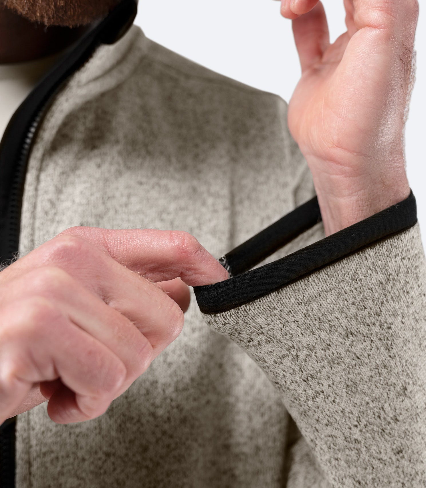 Close-up of sleeve cuff on Zhik Men’s Knit Fleece Jacket in light grey marle